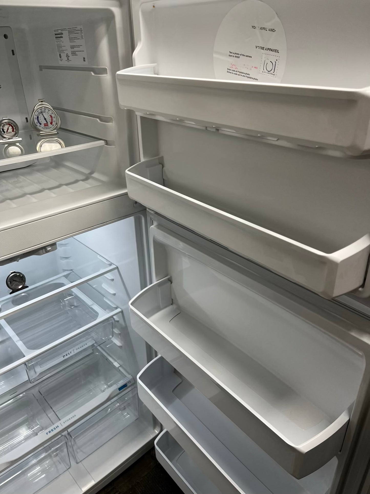 ^ ITEM: #RF53J Frigidaire top freezer white refrigerator 30” in