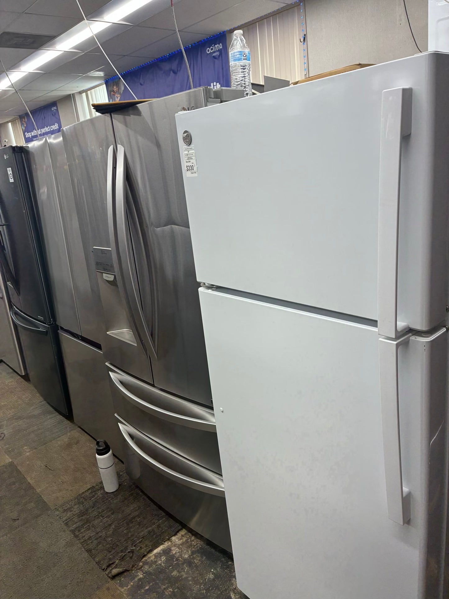 GE top freezer refrigerator white 28”