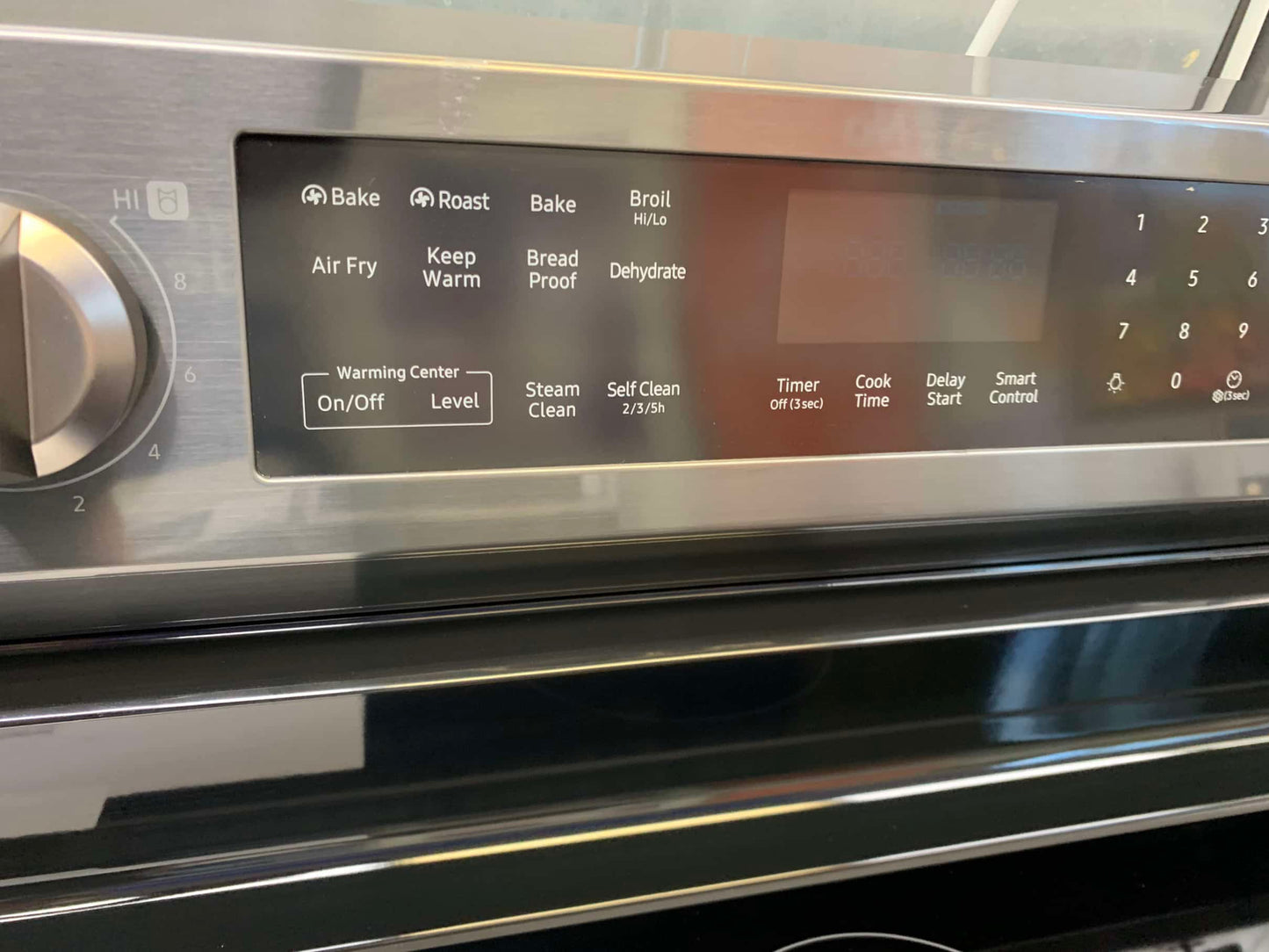 - ★ Samsung Open Box 6.3 cu. ft. Smart Wi-Fi Enabled Convection Electric Range with No Preheat AirFry in Black Stainless Steel - ER467