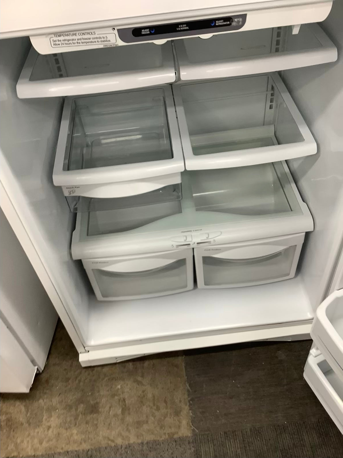 White GE top freezer w ice maker