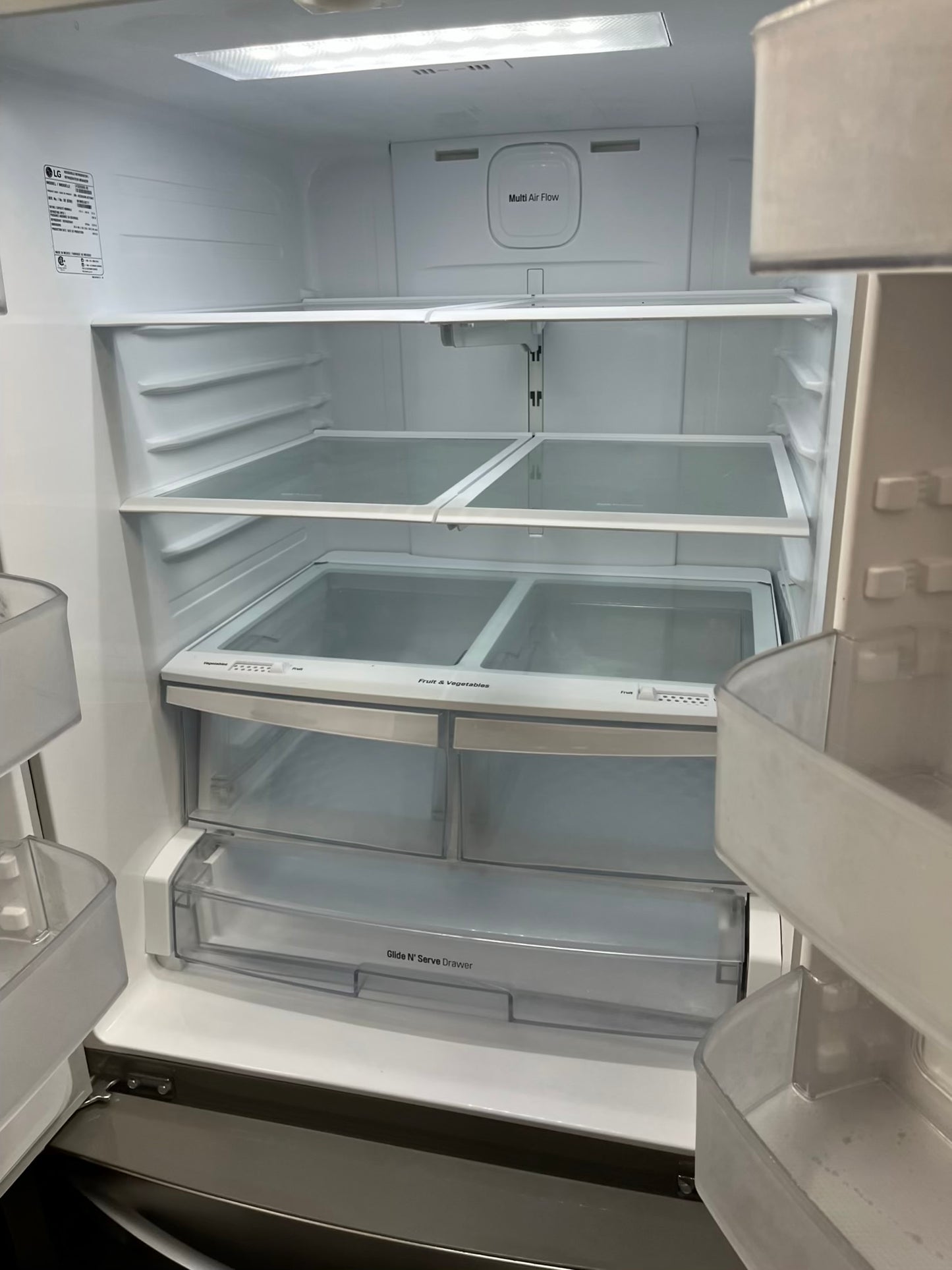 ^ #RF47W GE french door refrigerator slate stainless steel w/ ice and water dispenser inside 33” in