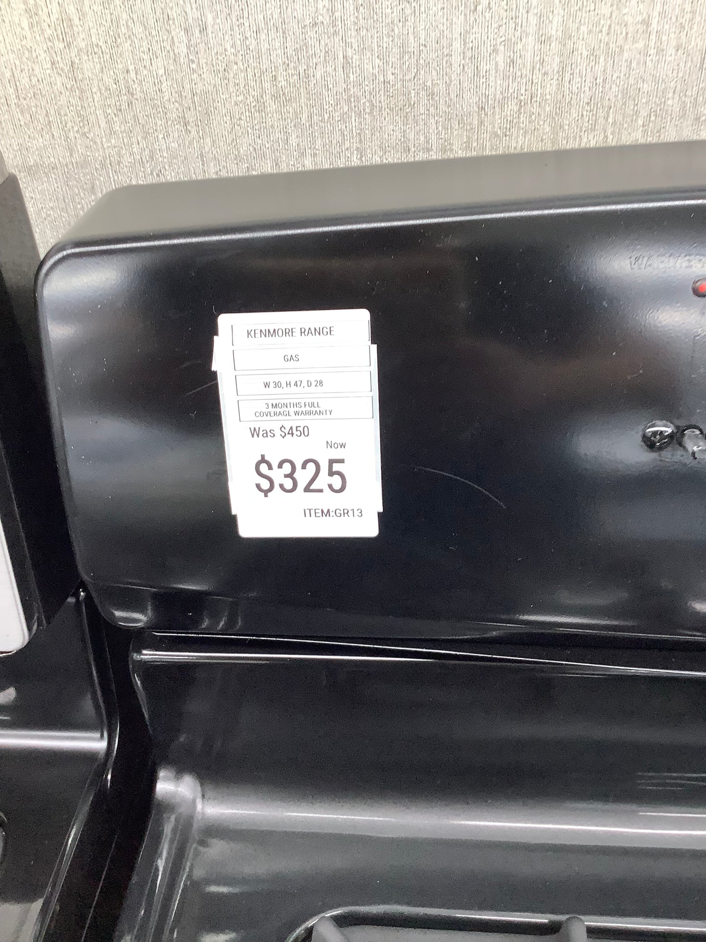 Kenmore gas range , 4 burner black color 30”