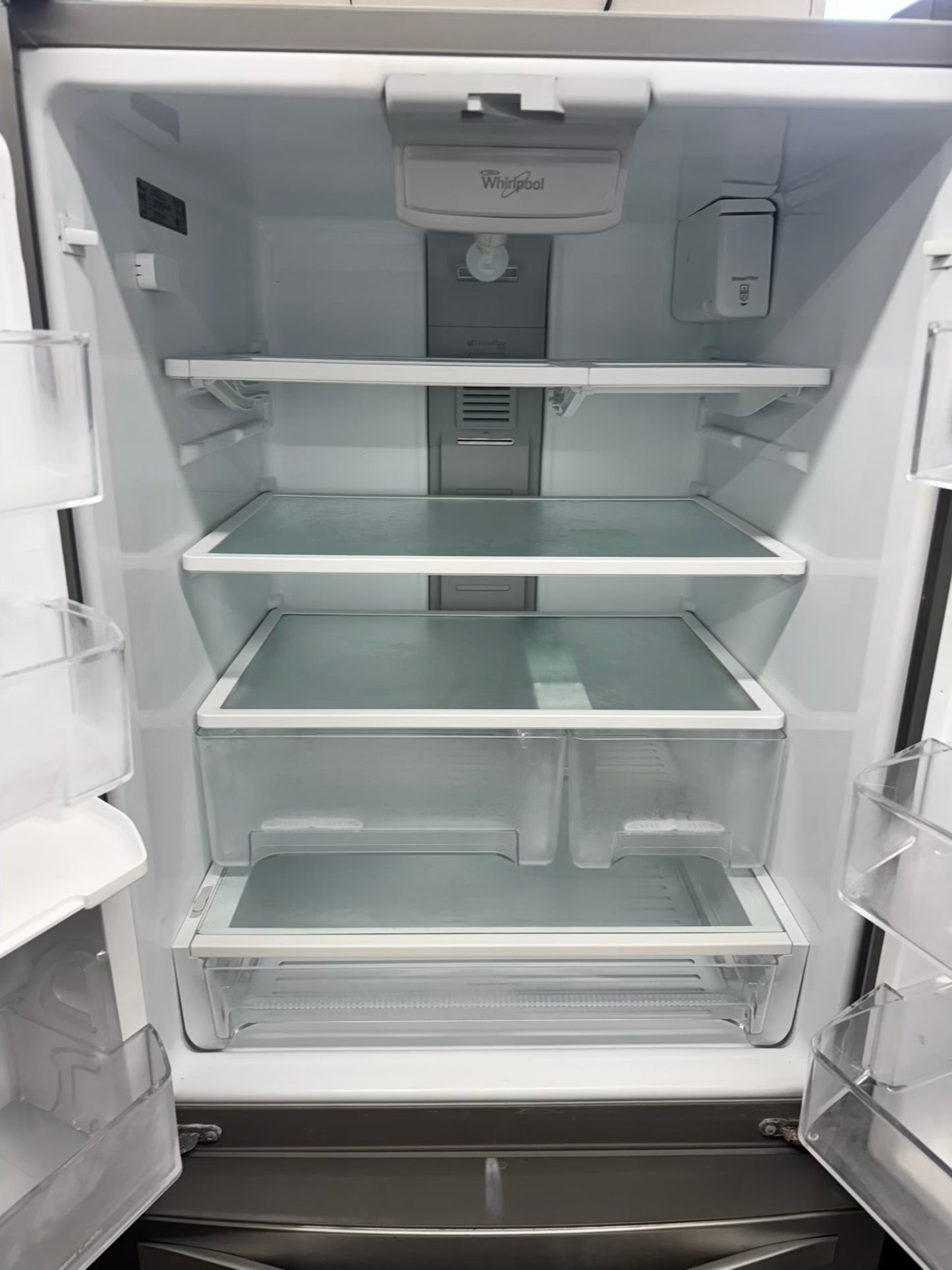 Whirpool 30 inch French door refrigerator stainless steel water dispenser and ice maker bottom