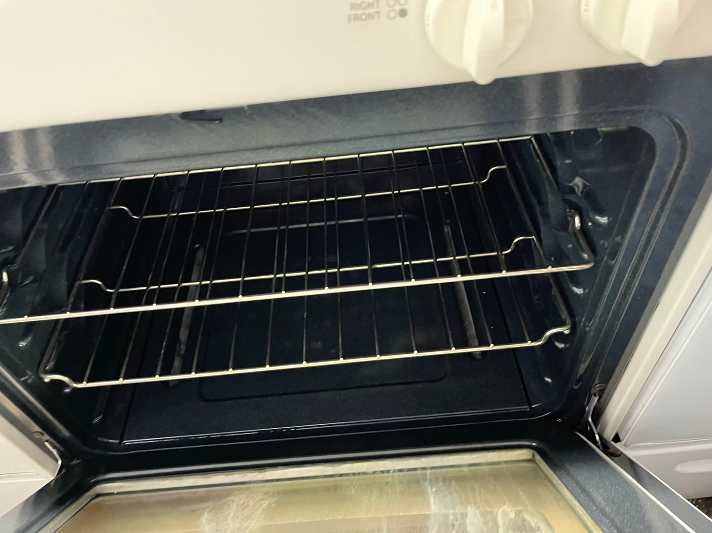 ^ ITEM #ER85G Kenmore gas range bisque 4 burner 24” in