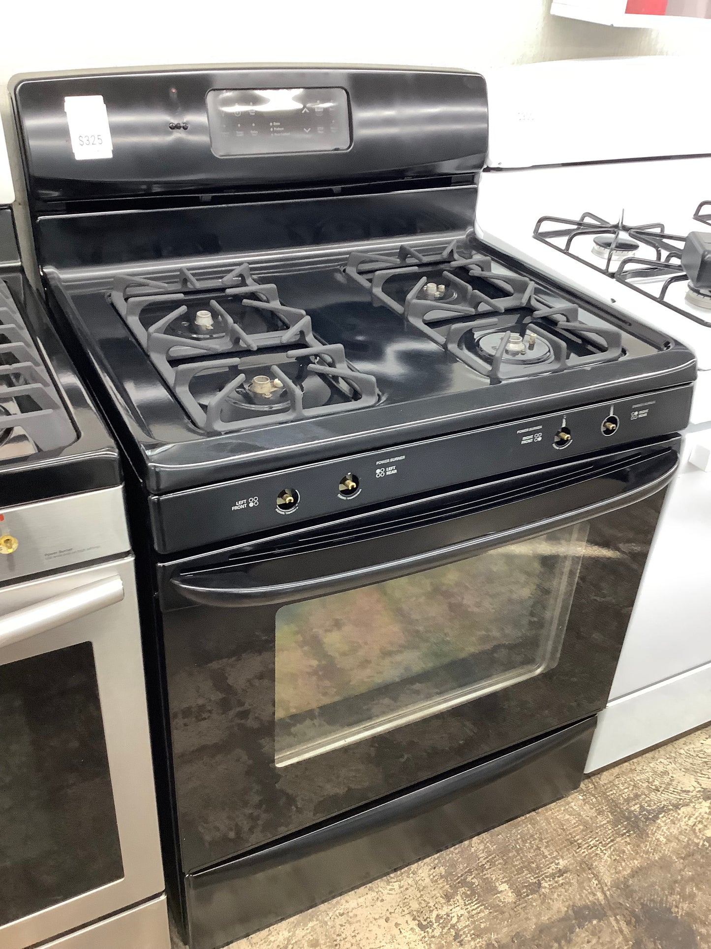 Kenmore gas range , 4 burner black color 30”