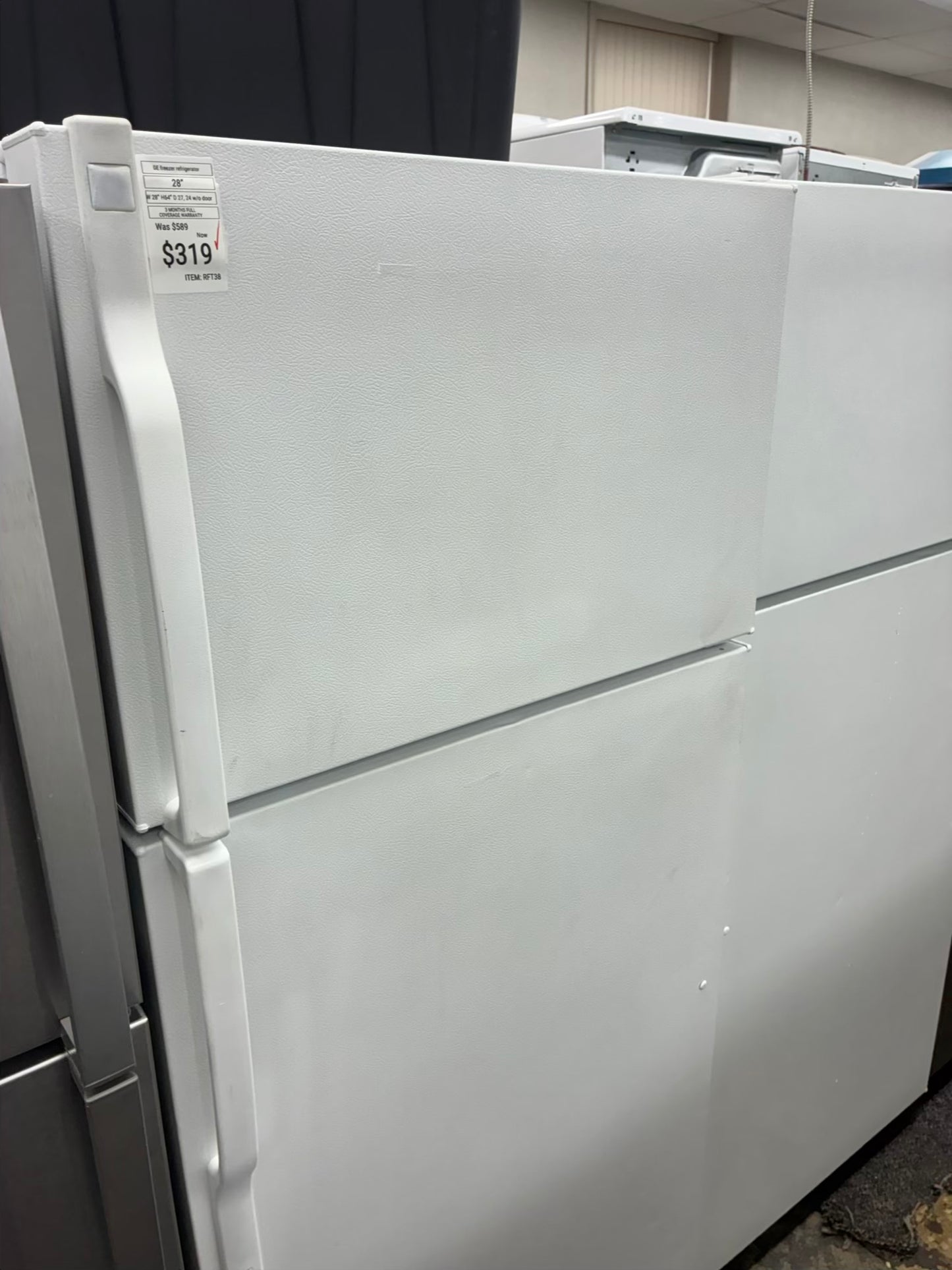 GE top freezer refrigerator white 28”