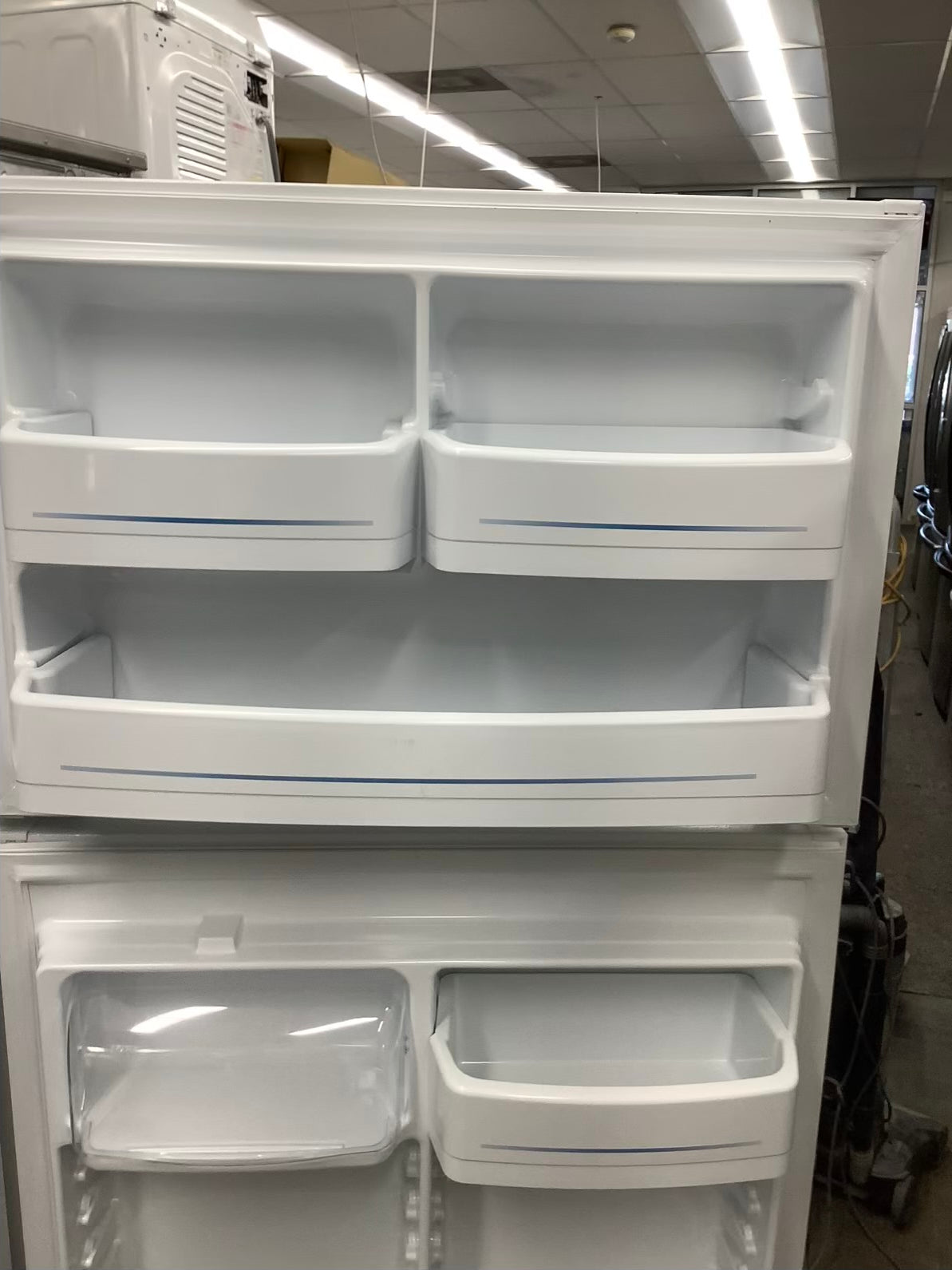 White GE top freezer w ice maker