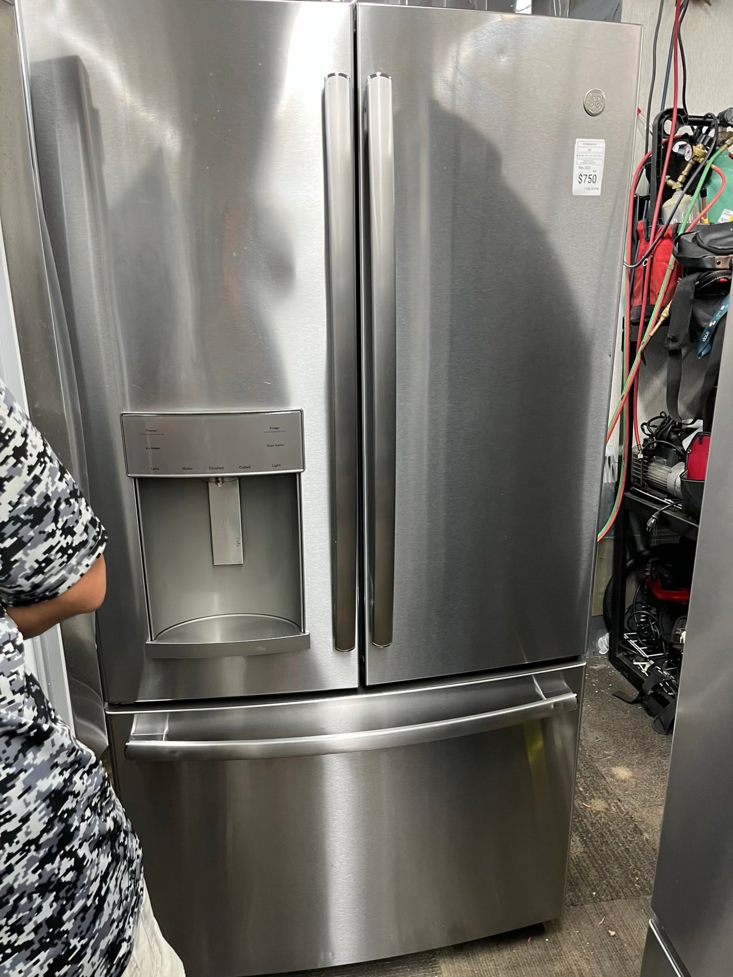 ^ #RF47W GE french door refrigerator slate stainless steel w/ ice and water dispenser inside 33” in