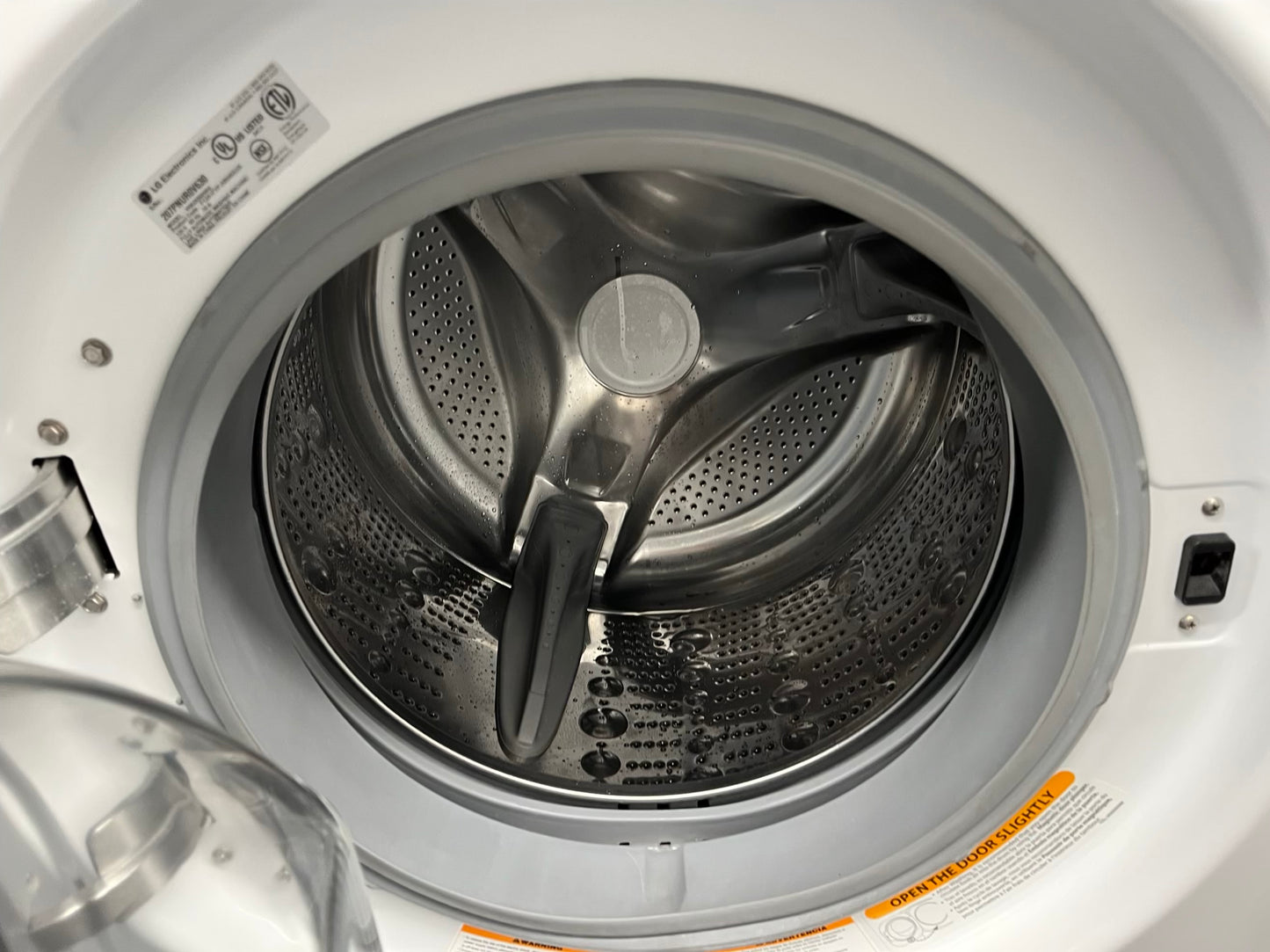 ^ ITEM #WD93D LG front load electric washer and dryer 220v stackable large capacity stainless steel drum 27 in D