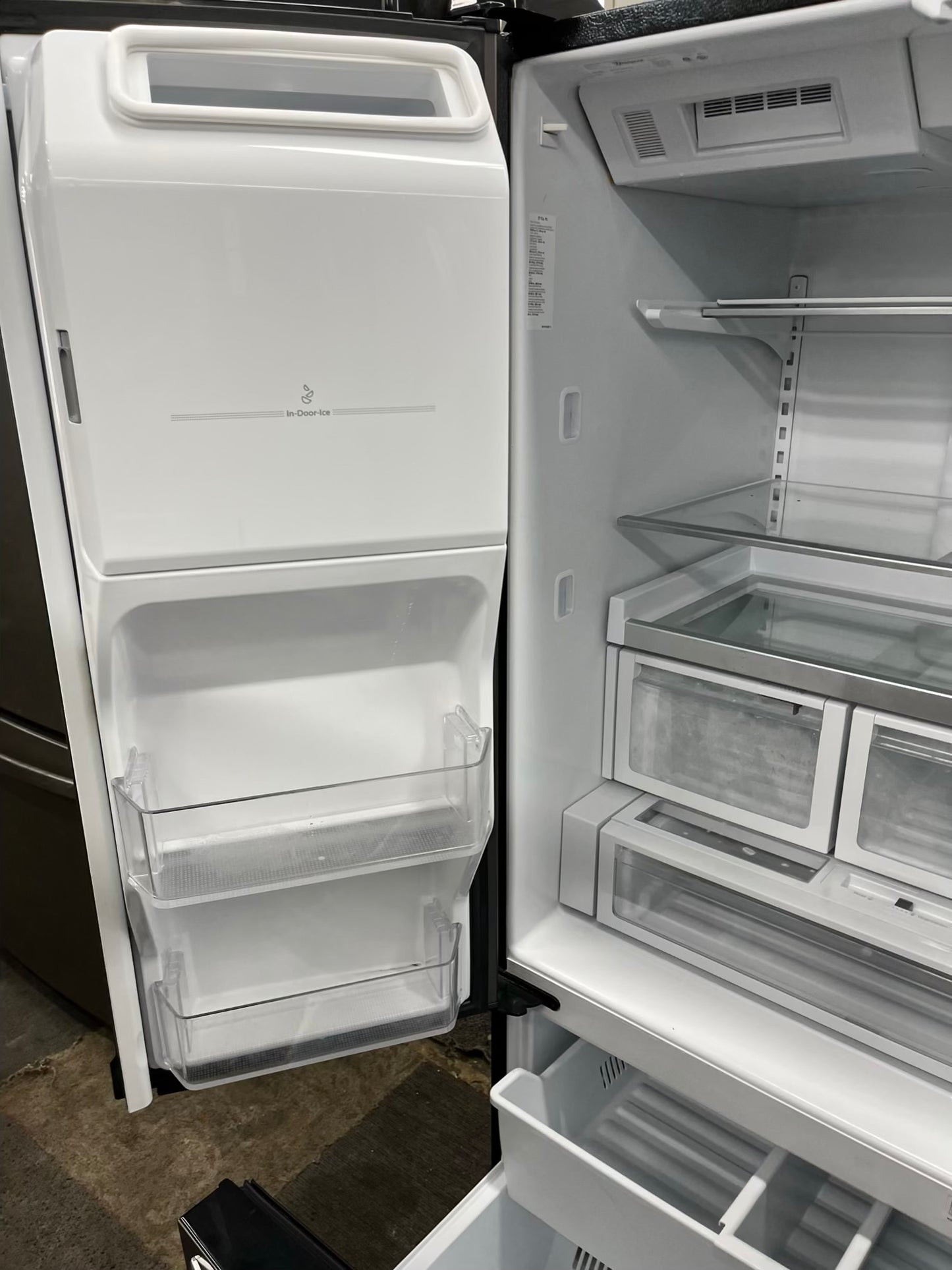 ^ Item: #RF74F Whirlpool french door refrigerator slate stainless steel w/ ice and water dispenser 36” in