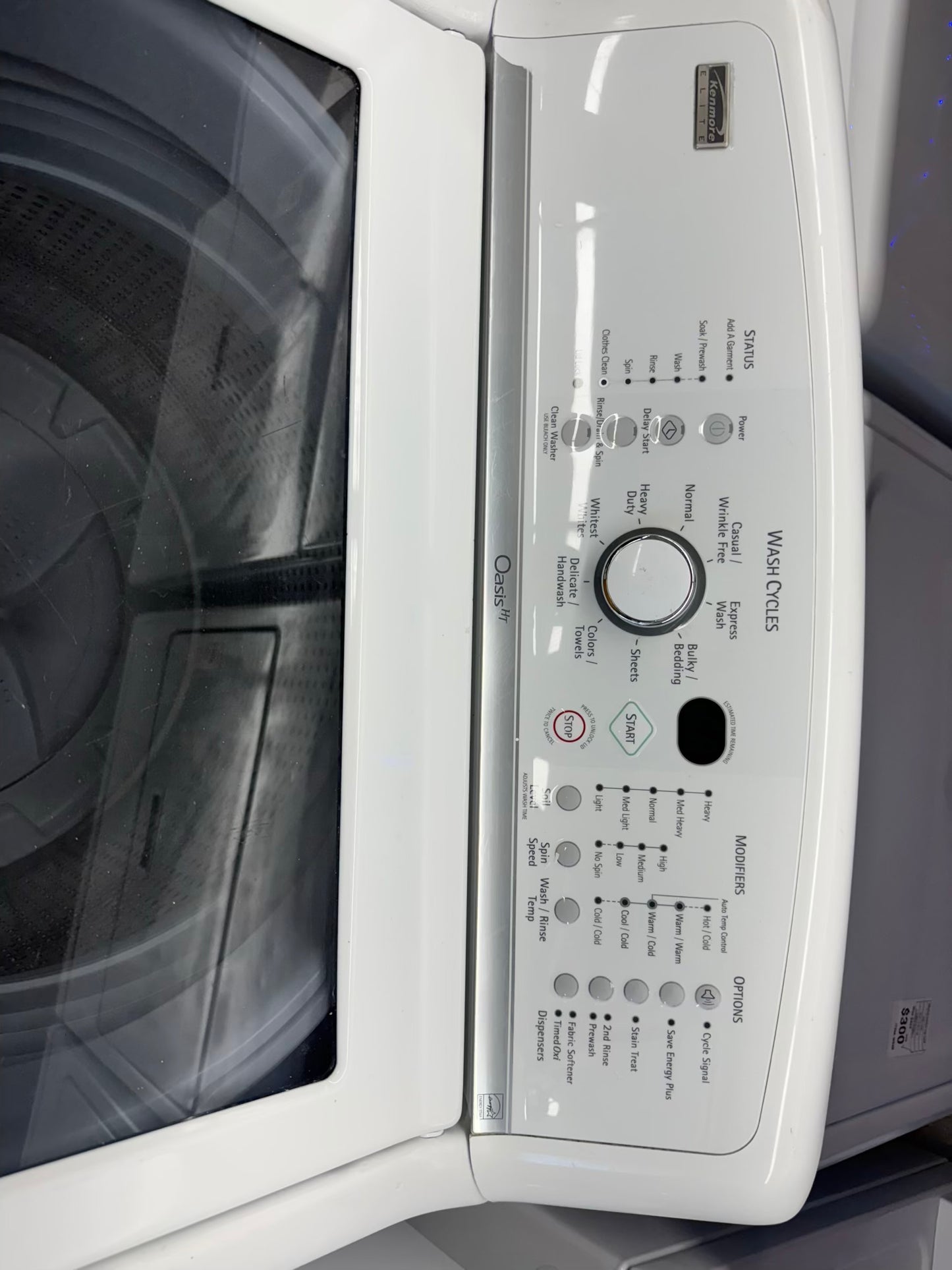 Kenmore elite oasis HT top load washer machine whit glass door and clean washer technology