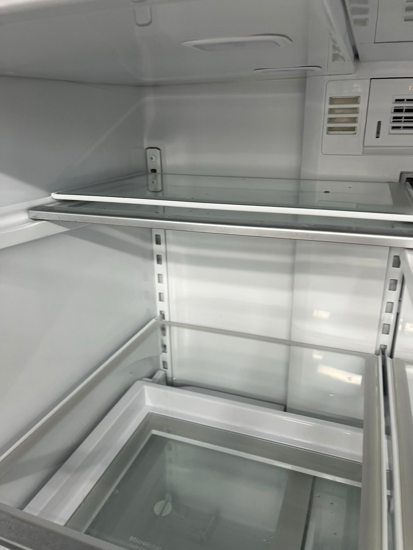 ^ Item: #RF74F Whirlpool french door refrigerator slate stainless steel w/ ice and water dispenser 36” in