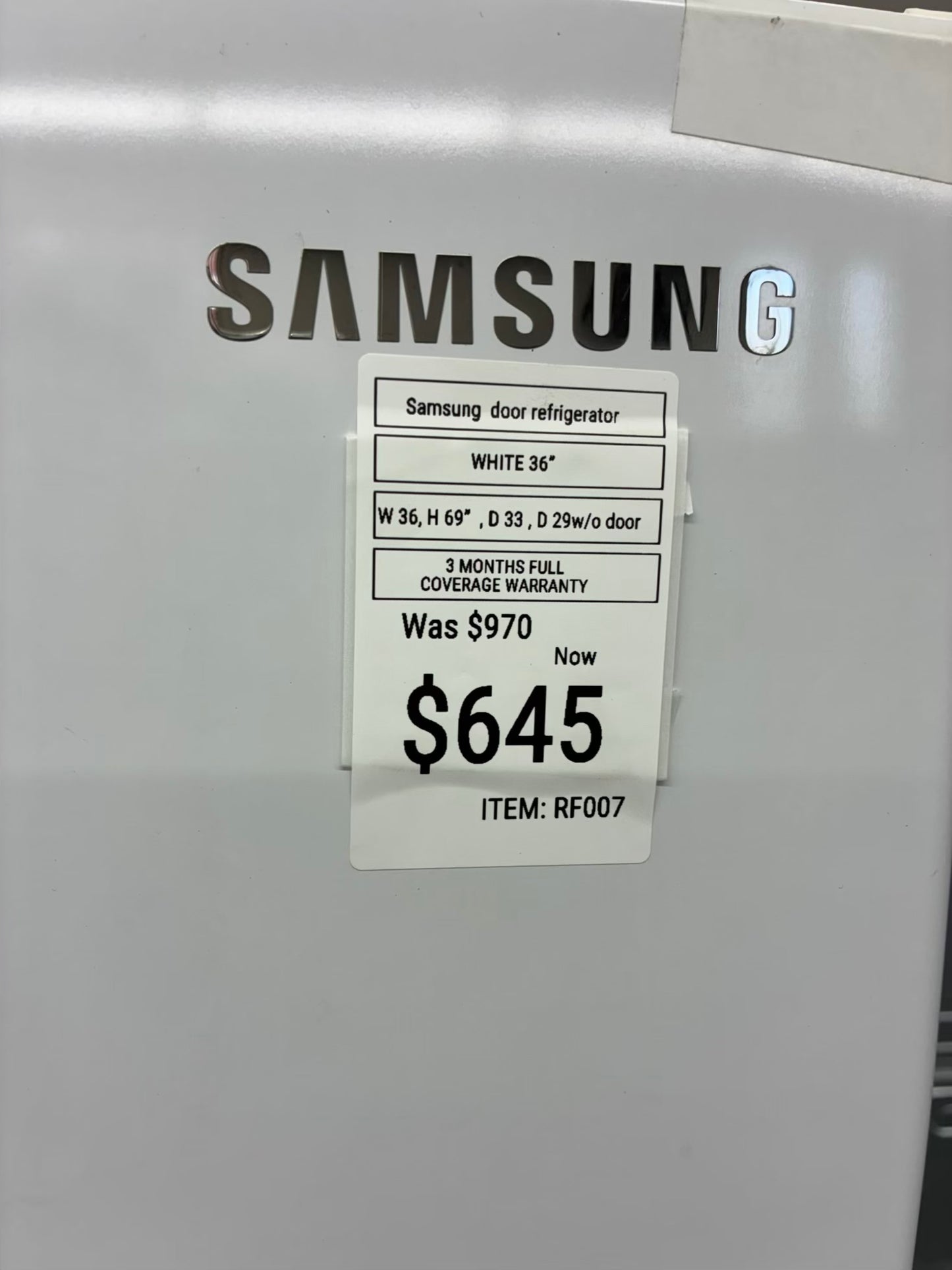 Samsung French door refrigerator white. w/ ice and water dispenser inside 36” in