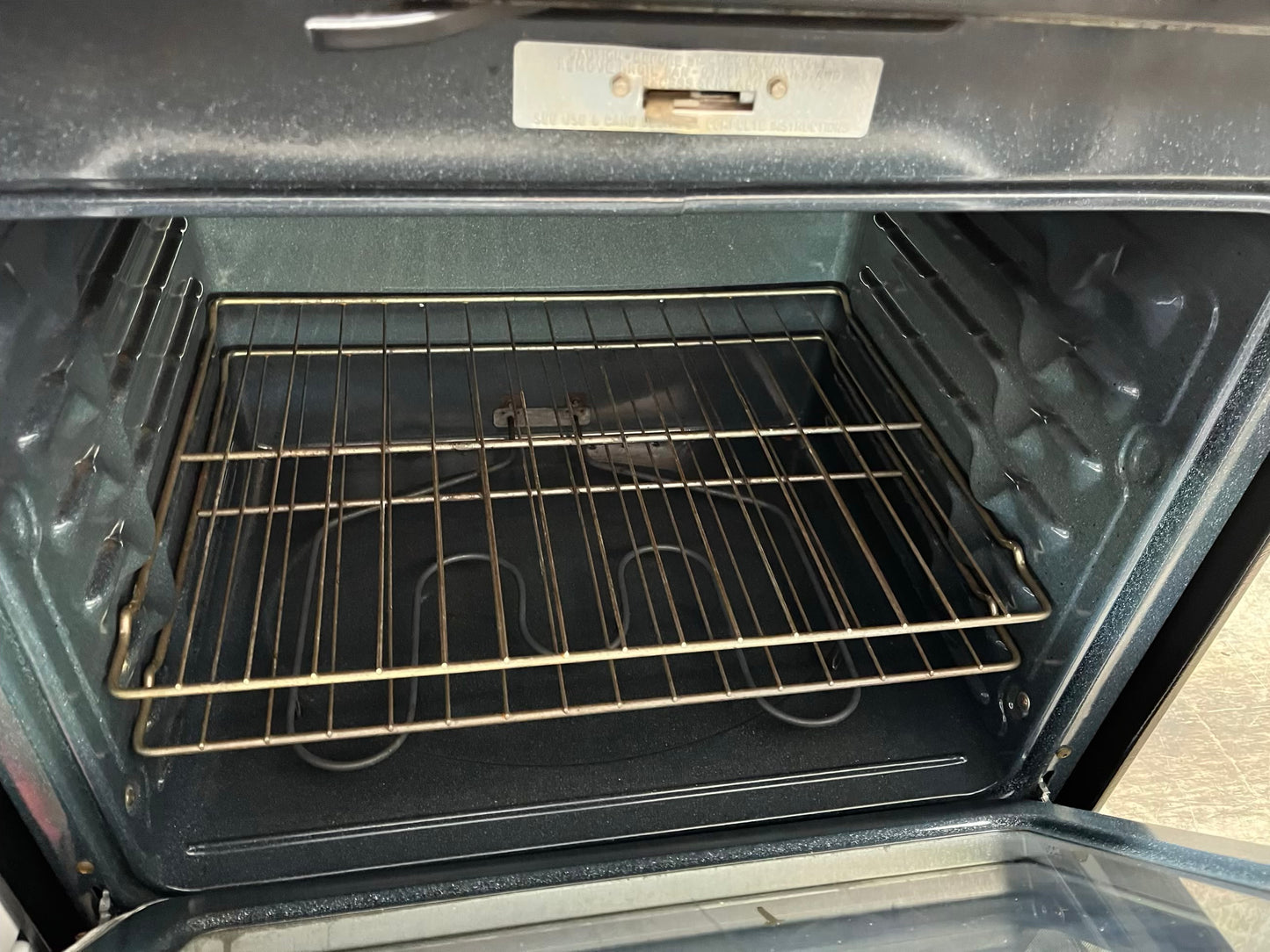 ^ Item : #ER93V GE electric range 4 burner stainless steel