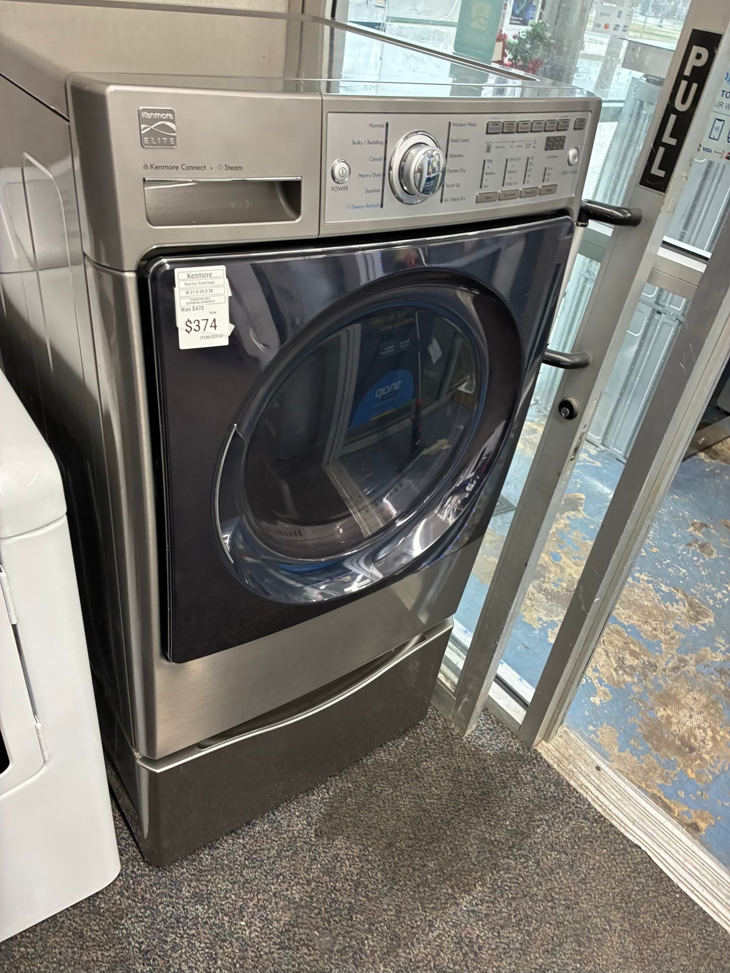 Kenmore Electric Dryer 27” white front load with pedestal