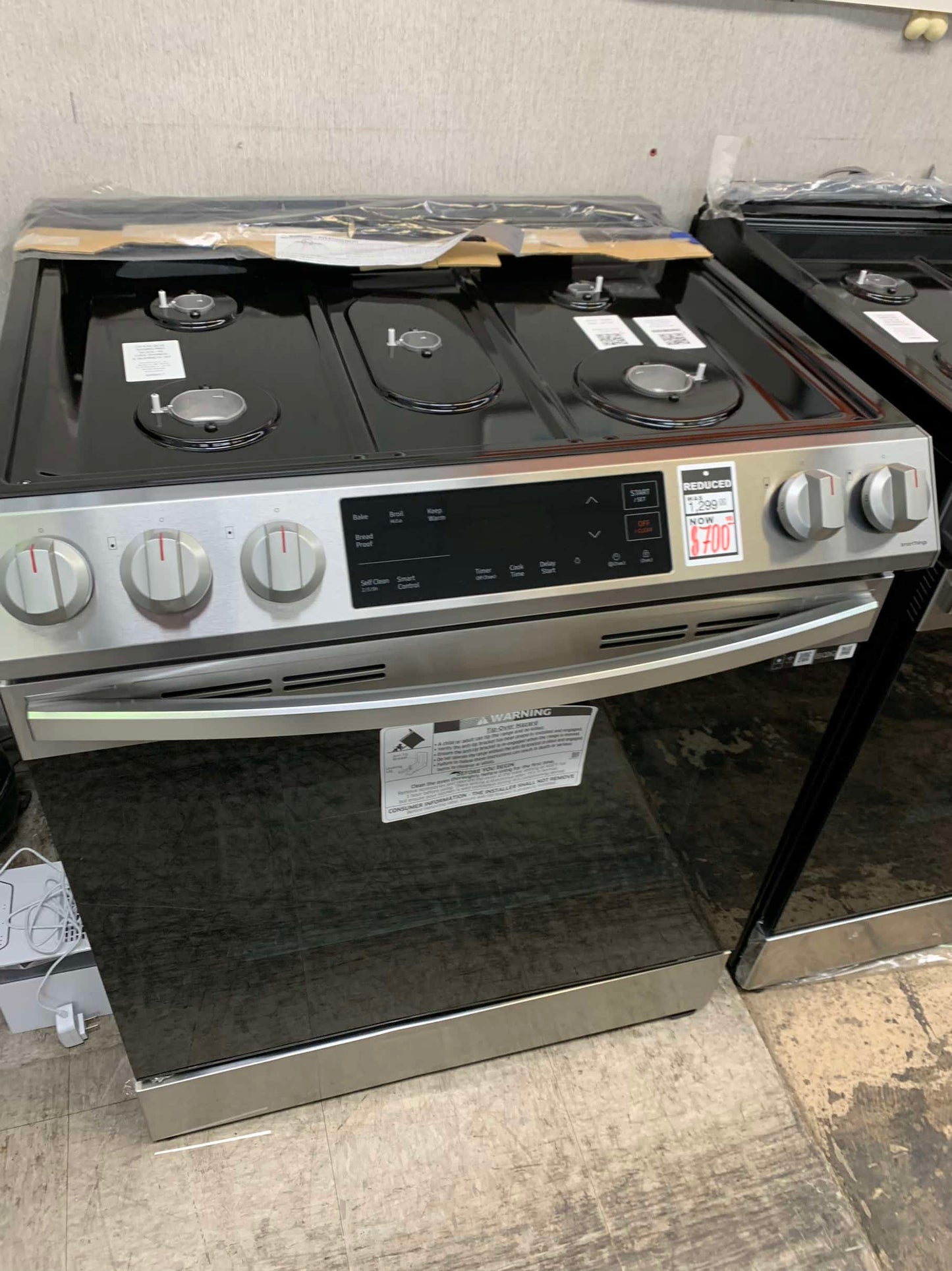 ★ Samsung Open Box 30 in. 6.0 cu. ft. Slide-In Gas Range with Self-Cleaning Oven in Stainless Steel GR916