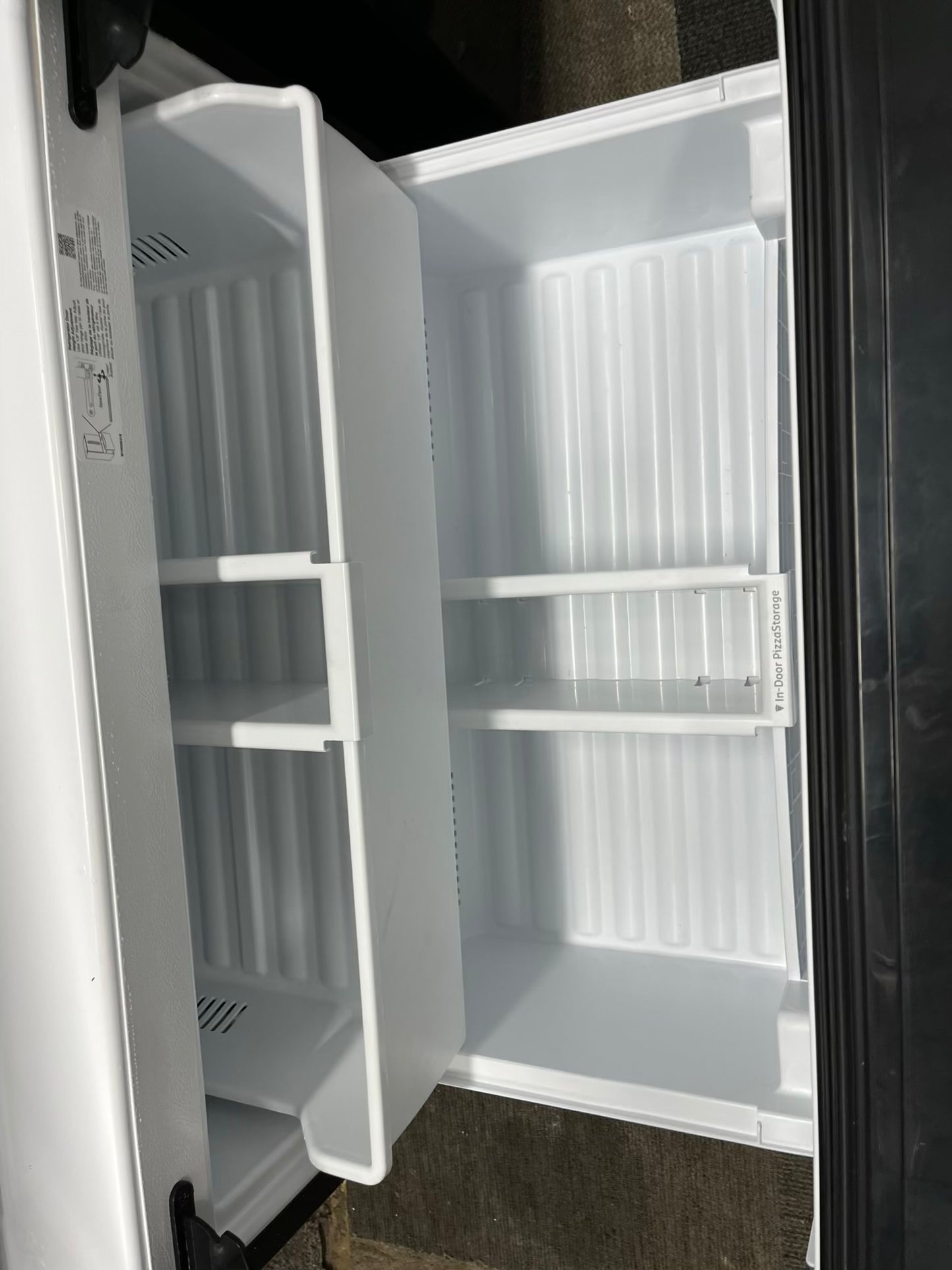 ^ Item: #RF74F Whirlpool french door refrigerator slate stainless steel w/ ice and water dispenser 36” in