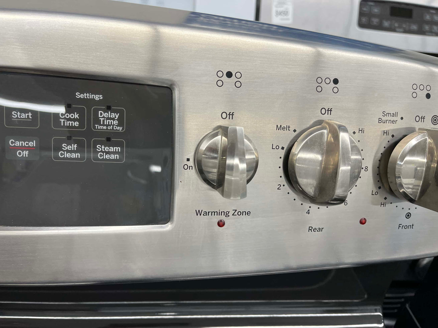 . ITEM #GR33B GE Stainless steel electric range 4 burner 30 inch *more pictures soon