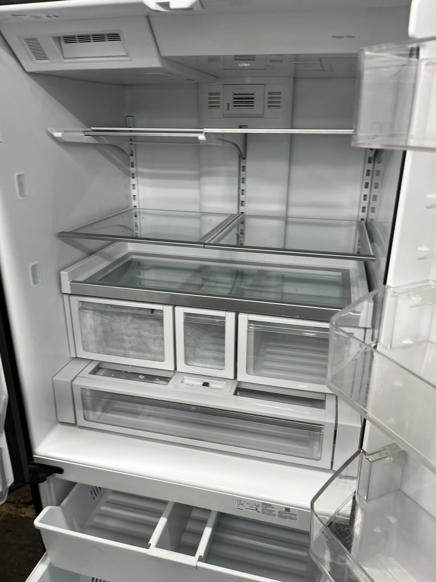 ^ Item: #RF74F Whirlpool french door refrigerator slate stainless steel w/ ice and water dispenser 36” in