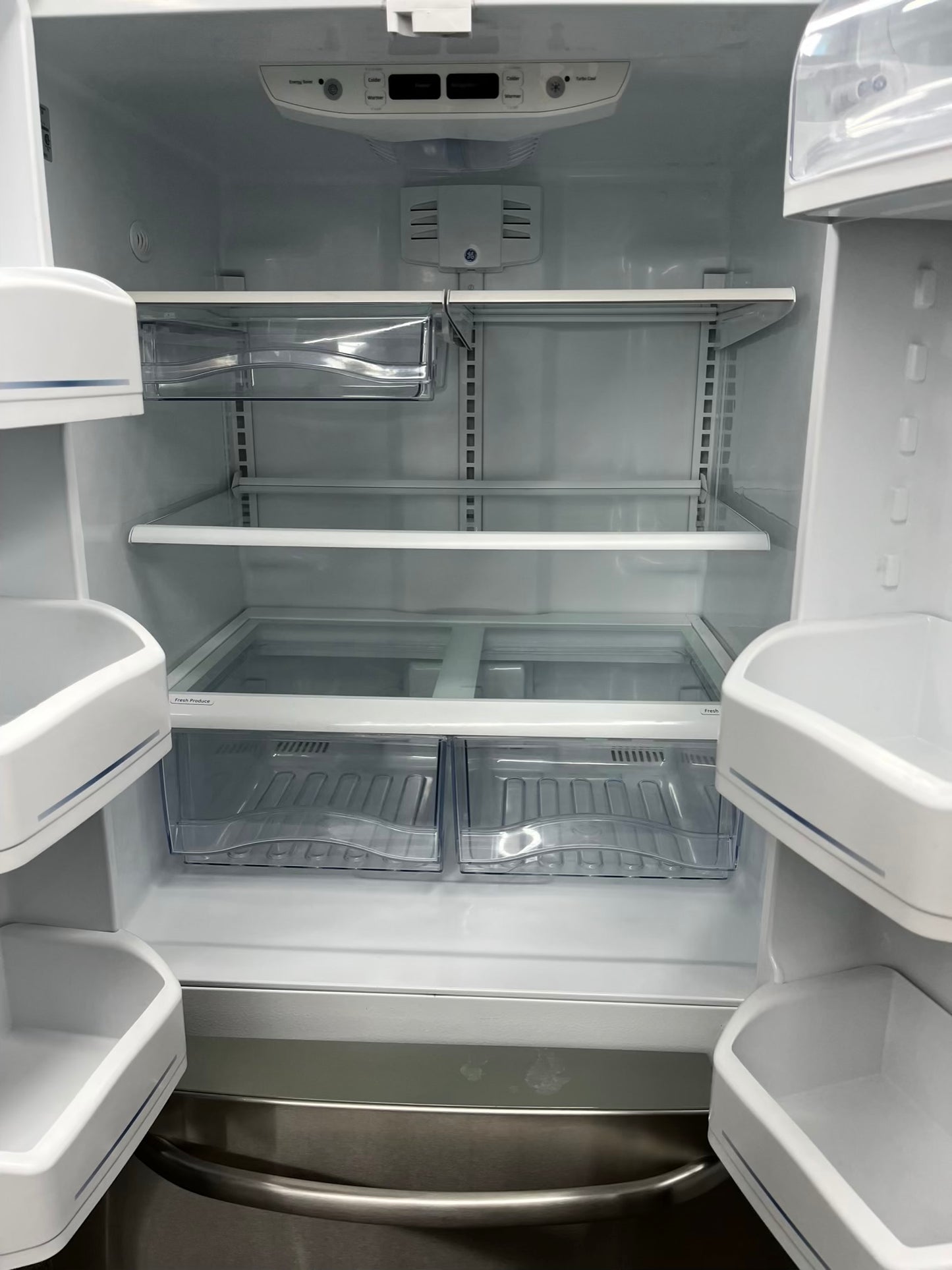 ^ Item #RF38P GE french door refrigerator stainless steel w/ ice dispenser inside 33” in