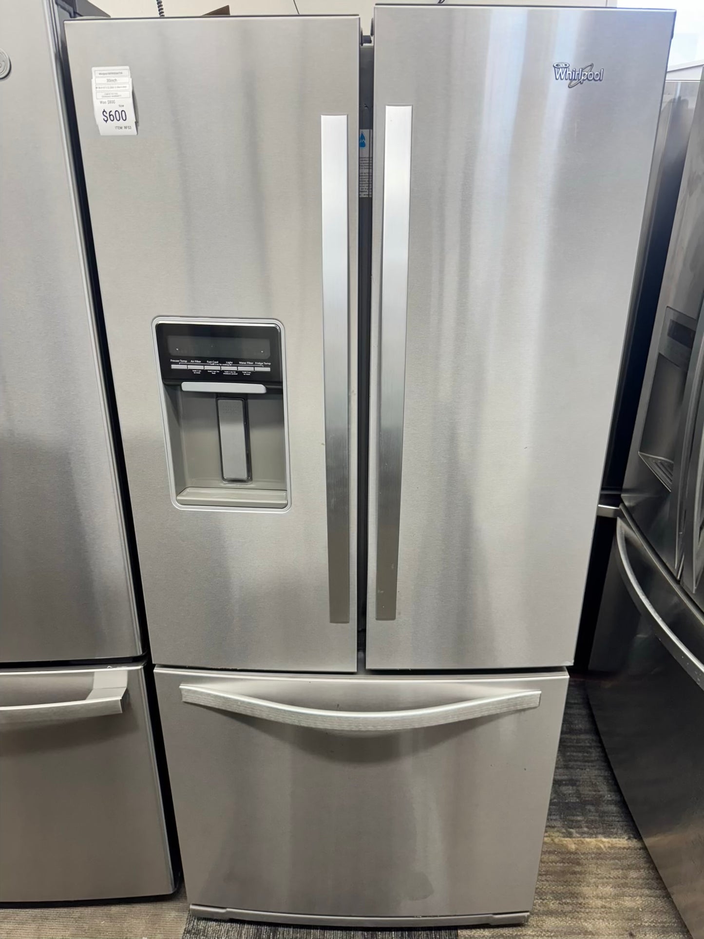 Whirpool 30 inch French door refrigerator stainless steel water dispenser and ice maker bottom
