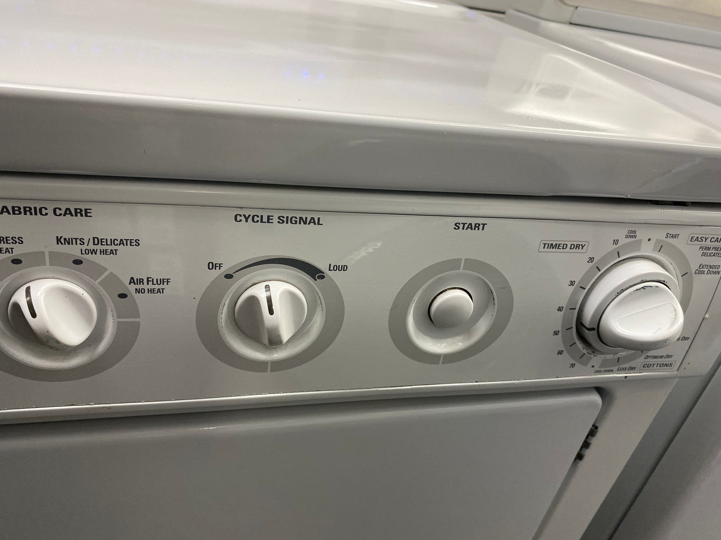 GE front load gas dryer white  white color and steel drum 27”