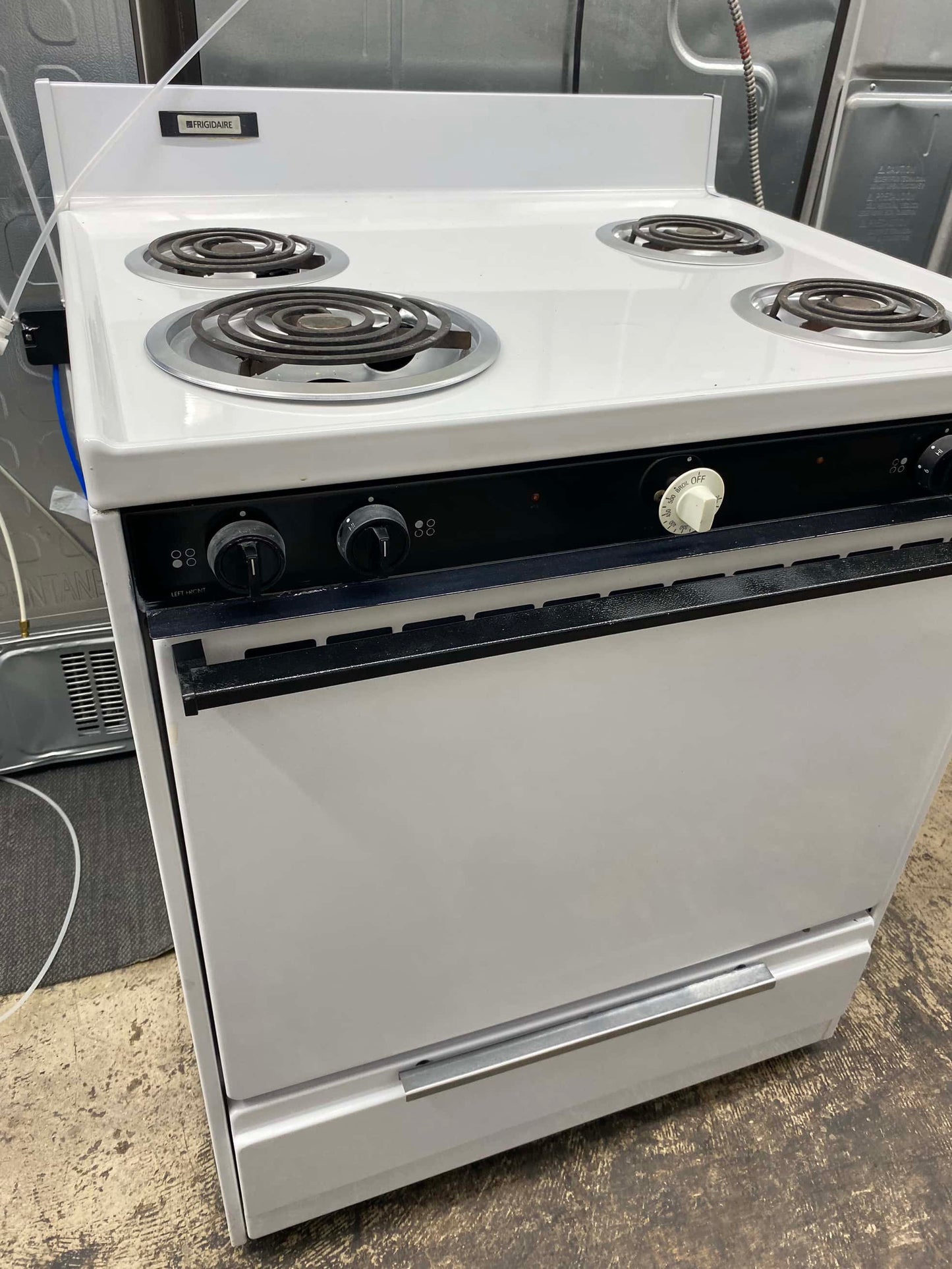 Item: #GR377 — Frigidaire electric range white coil 4 burner 30”