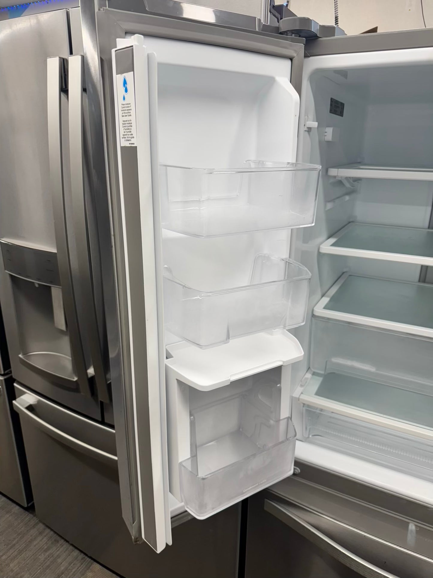 Whirpool 30 inch French door refrigerator stainless steel water dispenser and ice maker bottom