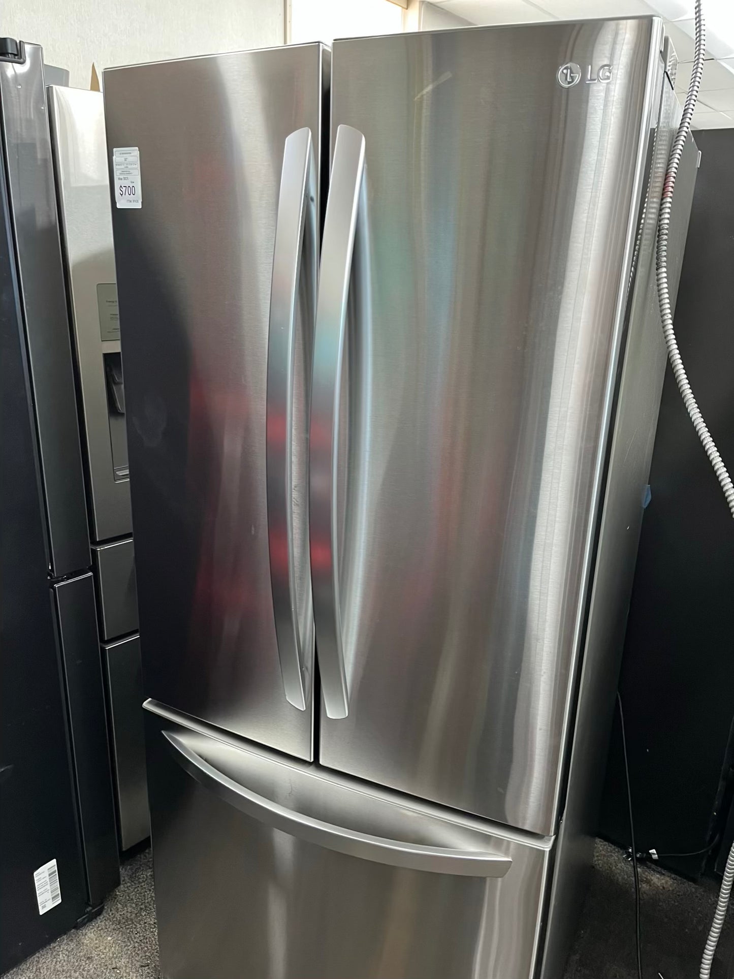 ^ #RF47W GE french door refrigerator slate stainless steel w/ ice and water dispenser inside 33” in