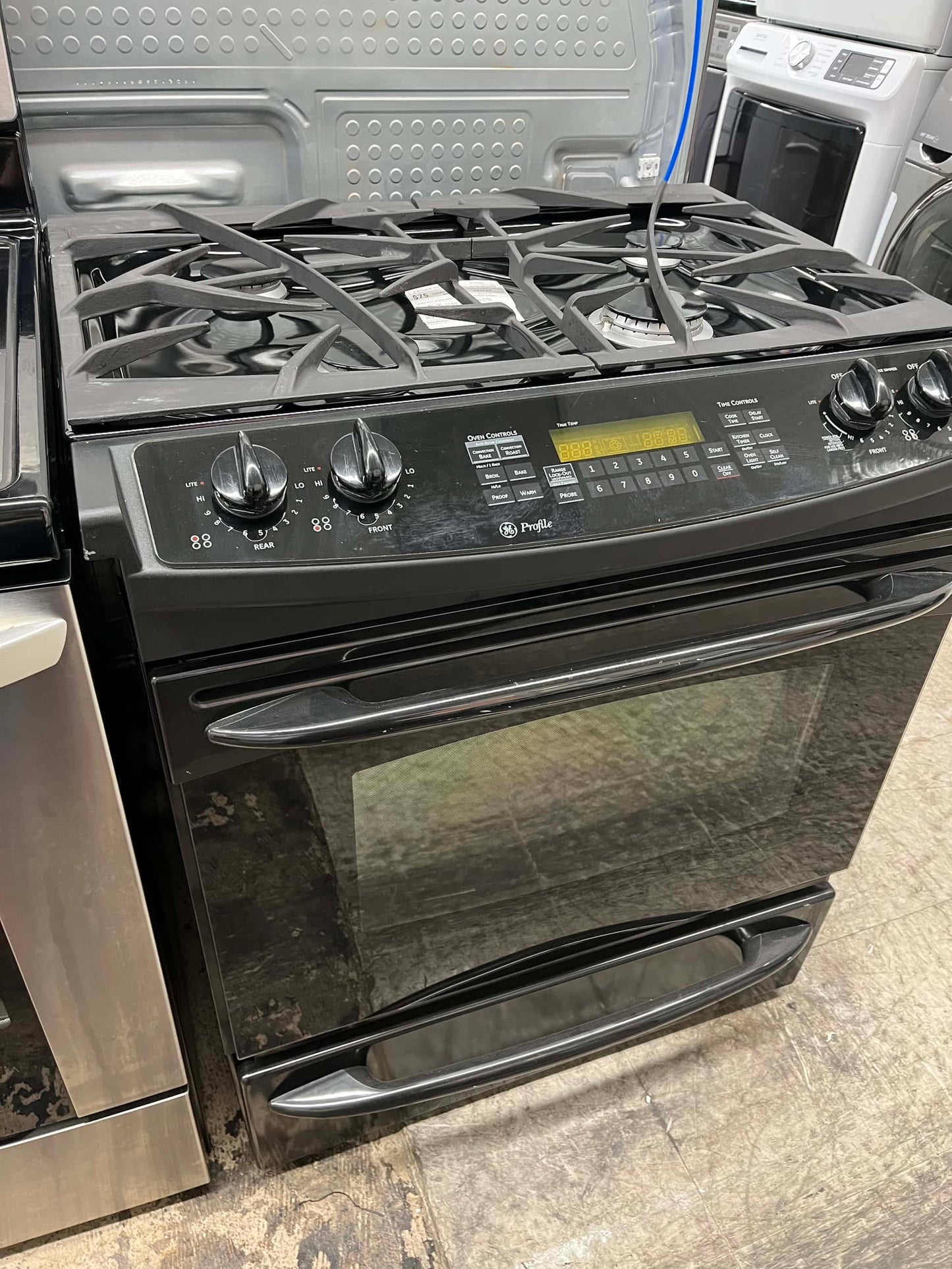 - ITEM #GR83 GE Duel fuel black gas range 5 burner 30 inch