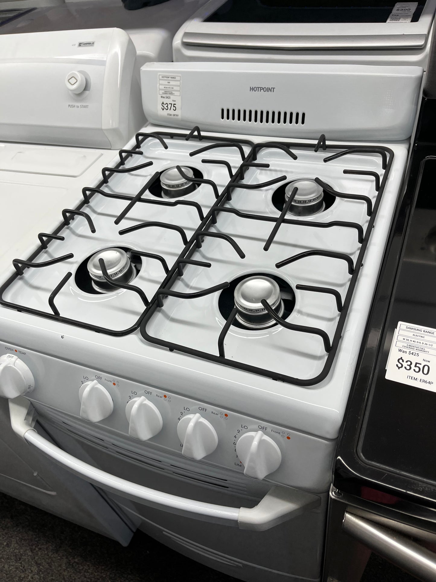 ^ ITEM #GR76Y Hotpoint gas range white 4 burner 20” in *more pictures soon
