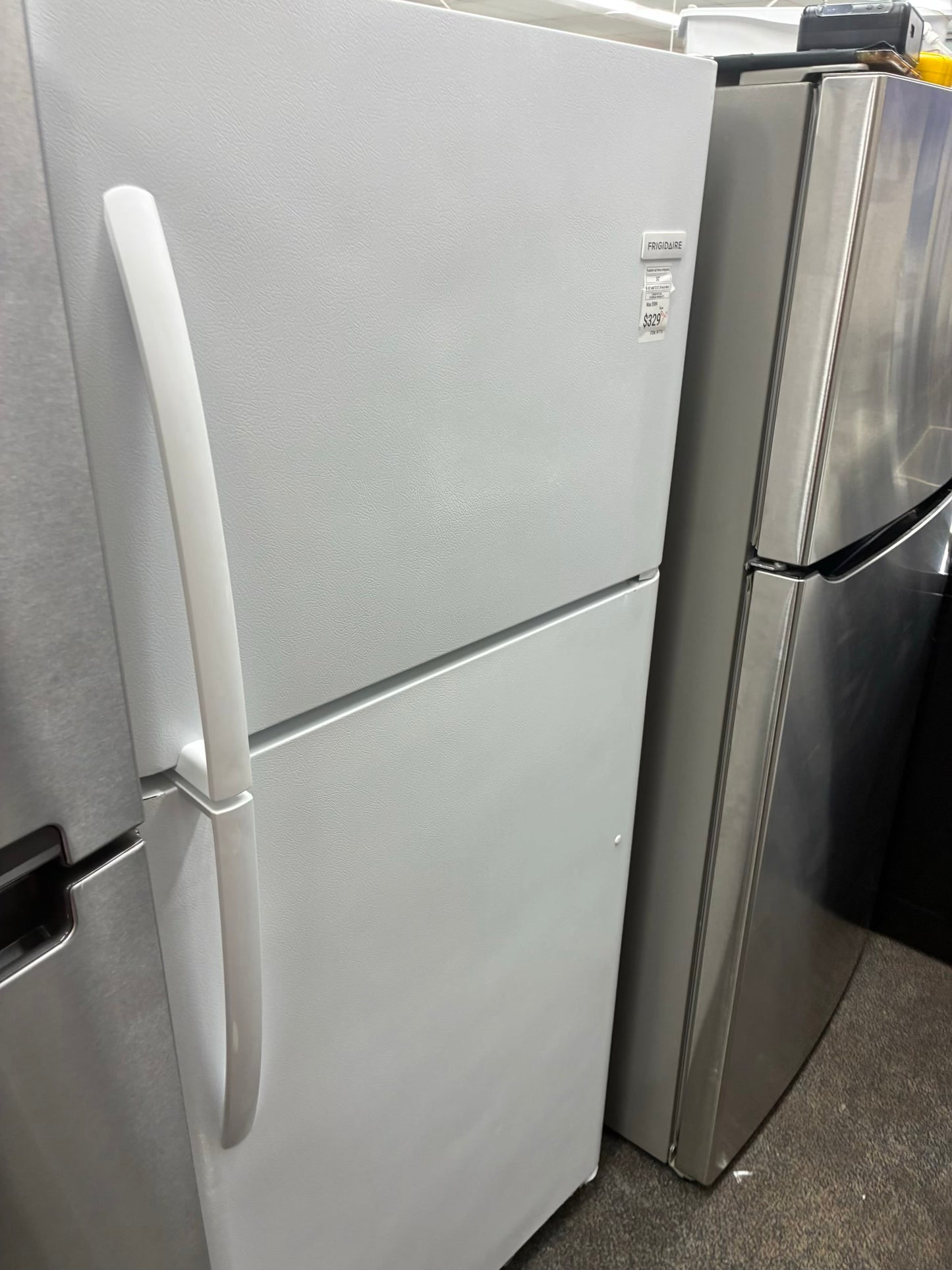 Frigidaire top freezer refrigerator black 30”