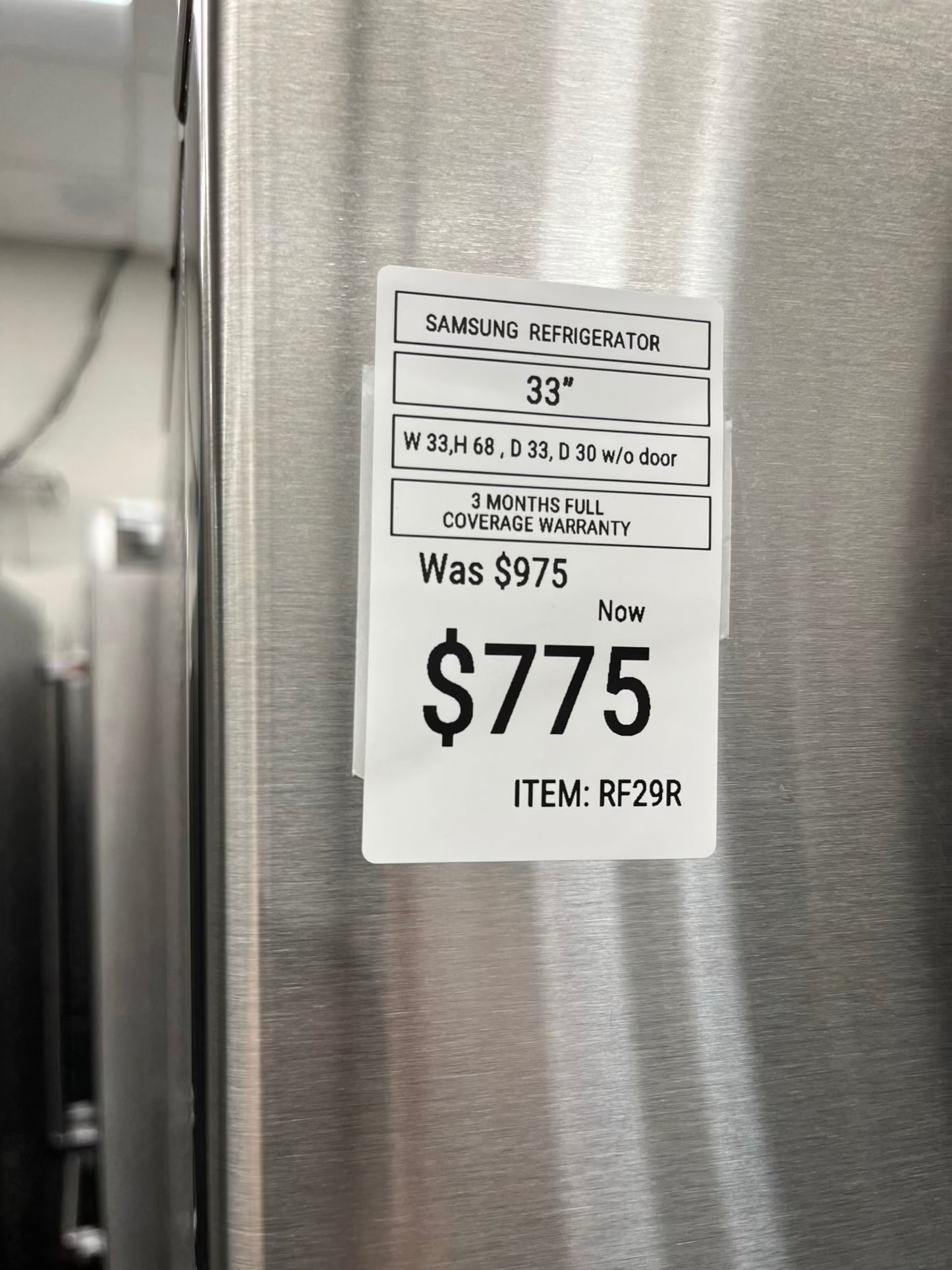 ^ Item #RF29R Samsung four door refrigerator stainless steel w/ ice and water dispenser inside 33’ in