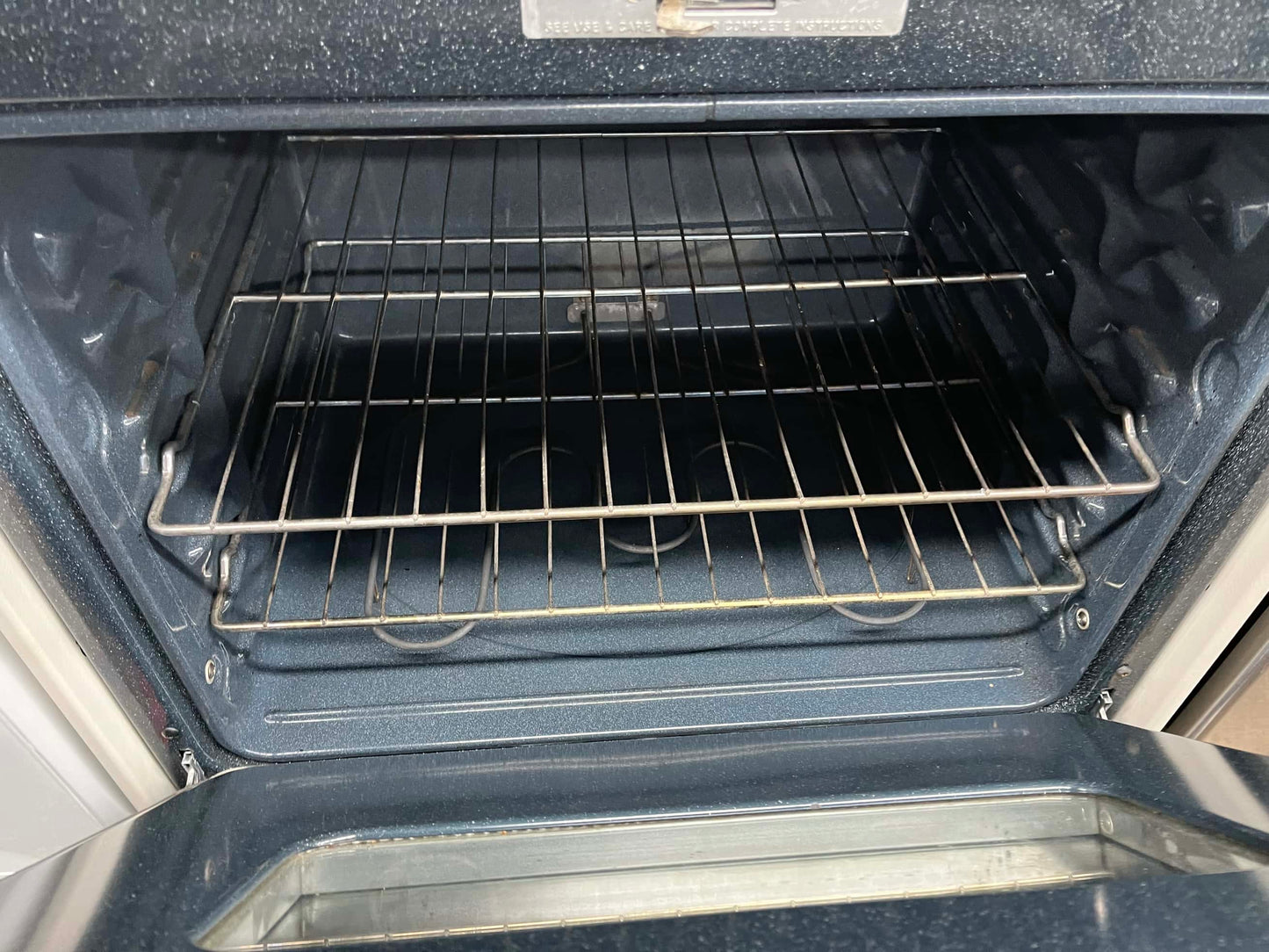 . ITEM #GR51N GE range black abd bisque electric range 4 burner 30 inch
