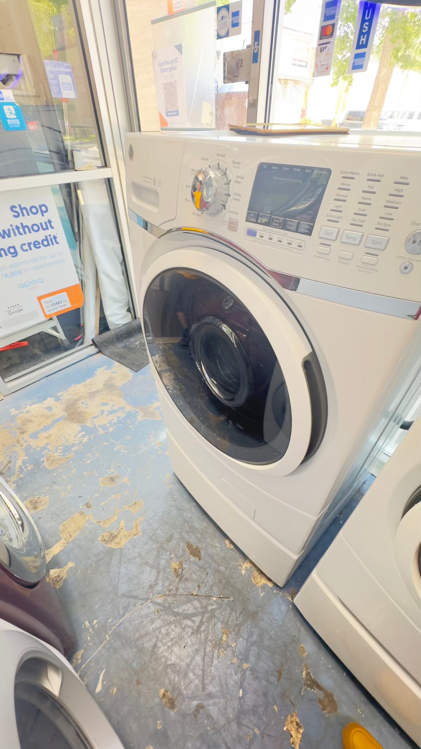 ^ GE washer & electric dryer set front load whit pedestal