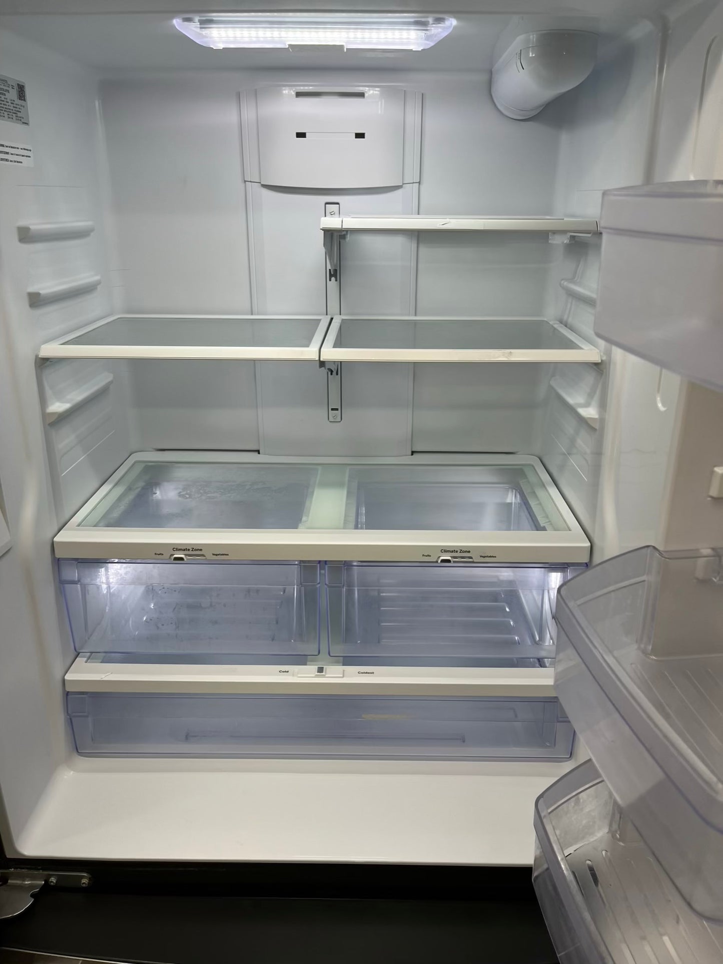 ^ Item: #RF28S GE french door countrr depth refrigerator slate stainless steel w/ ice and water dispenser inside 33” in