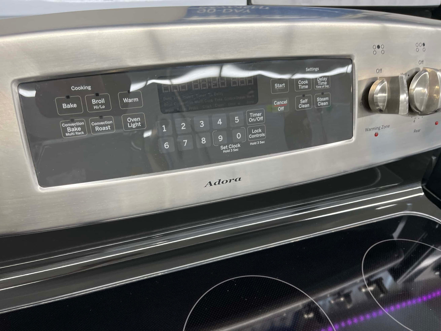 . ITEM #GR33B GE Stainless steel electric range 4 burner 30 inch *more pictures soon