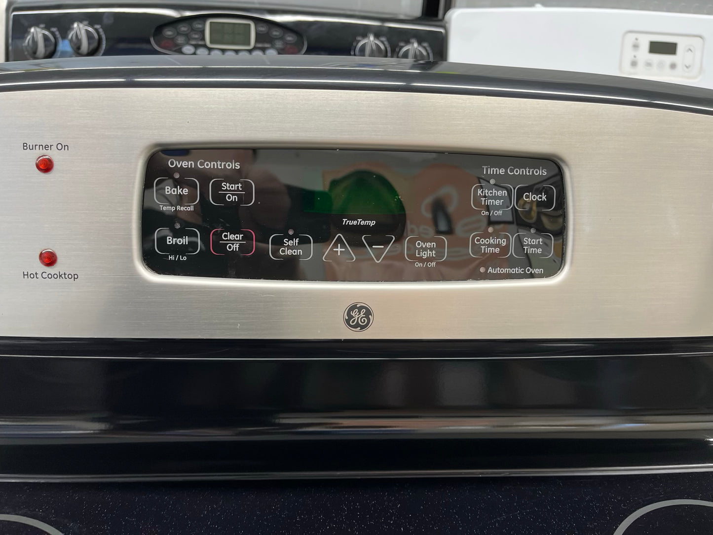 ^ Item : #ER93V GE electric range 4 burner stainless steel