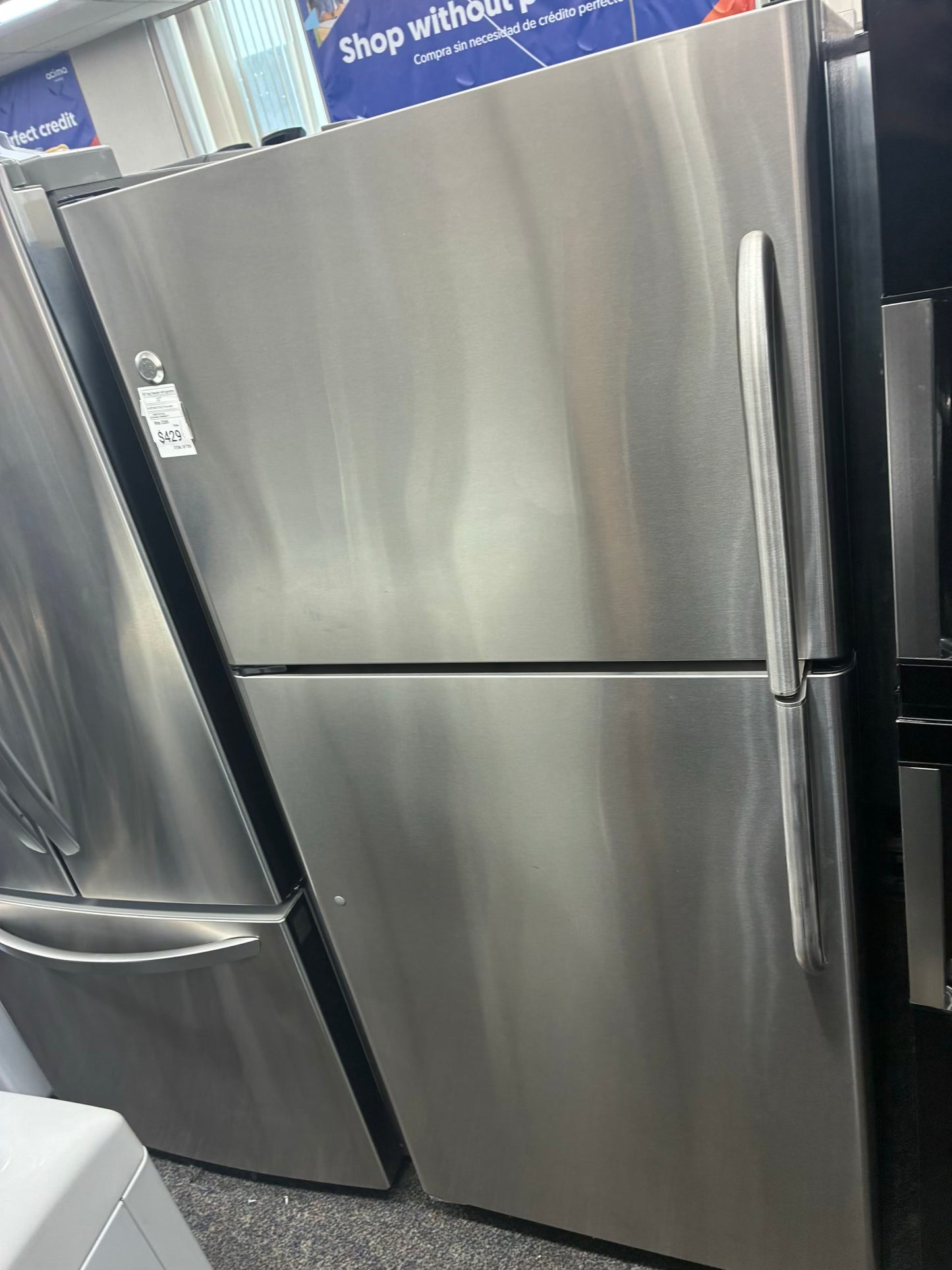 GE top freezer refrigerator stainless steel 30”