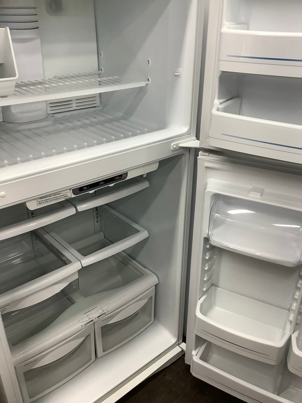 White GE top freezer w ice maker