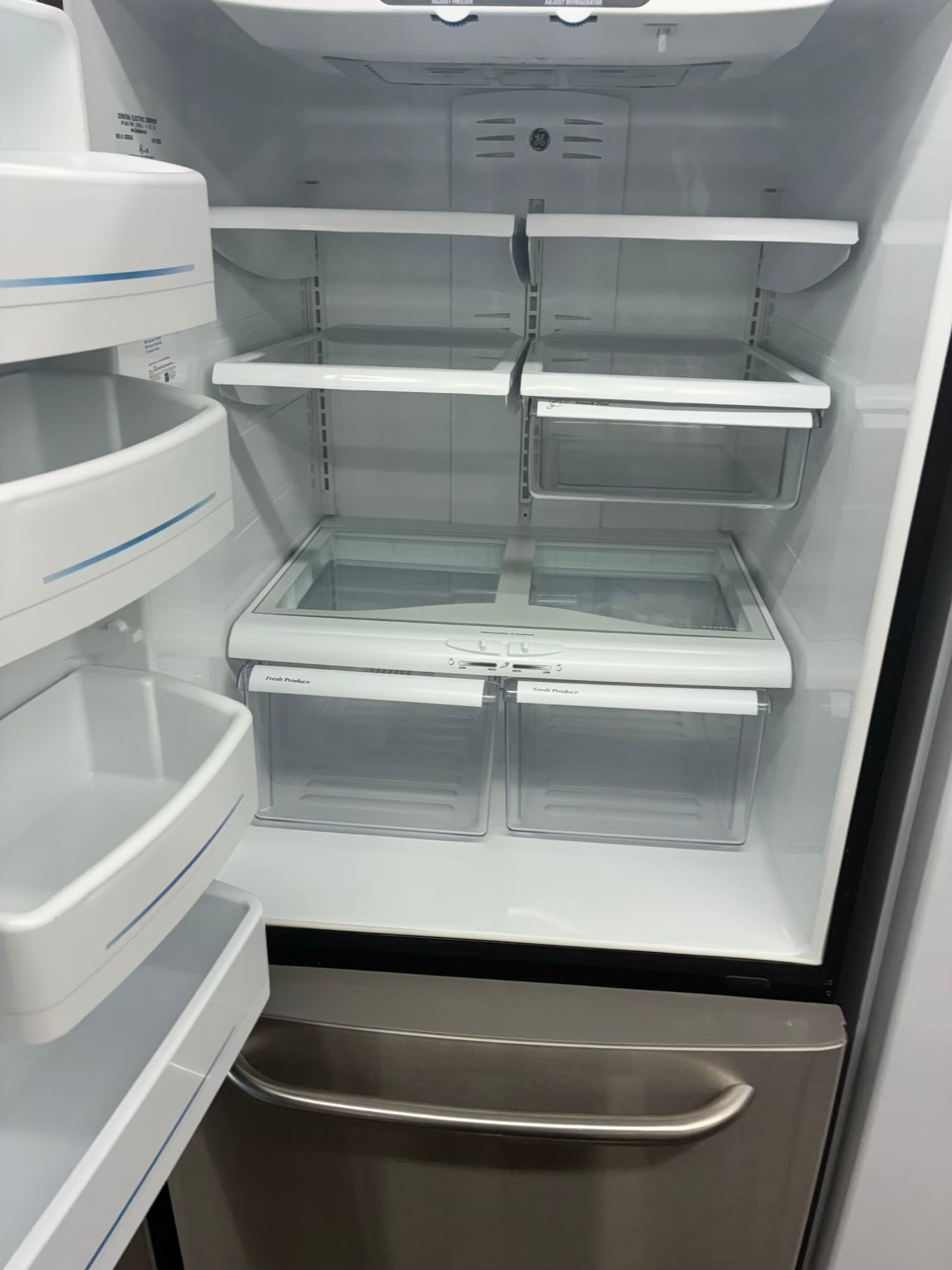 GE bottom freezer refrigerator stainless steel 30”