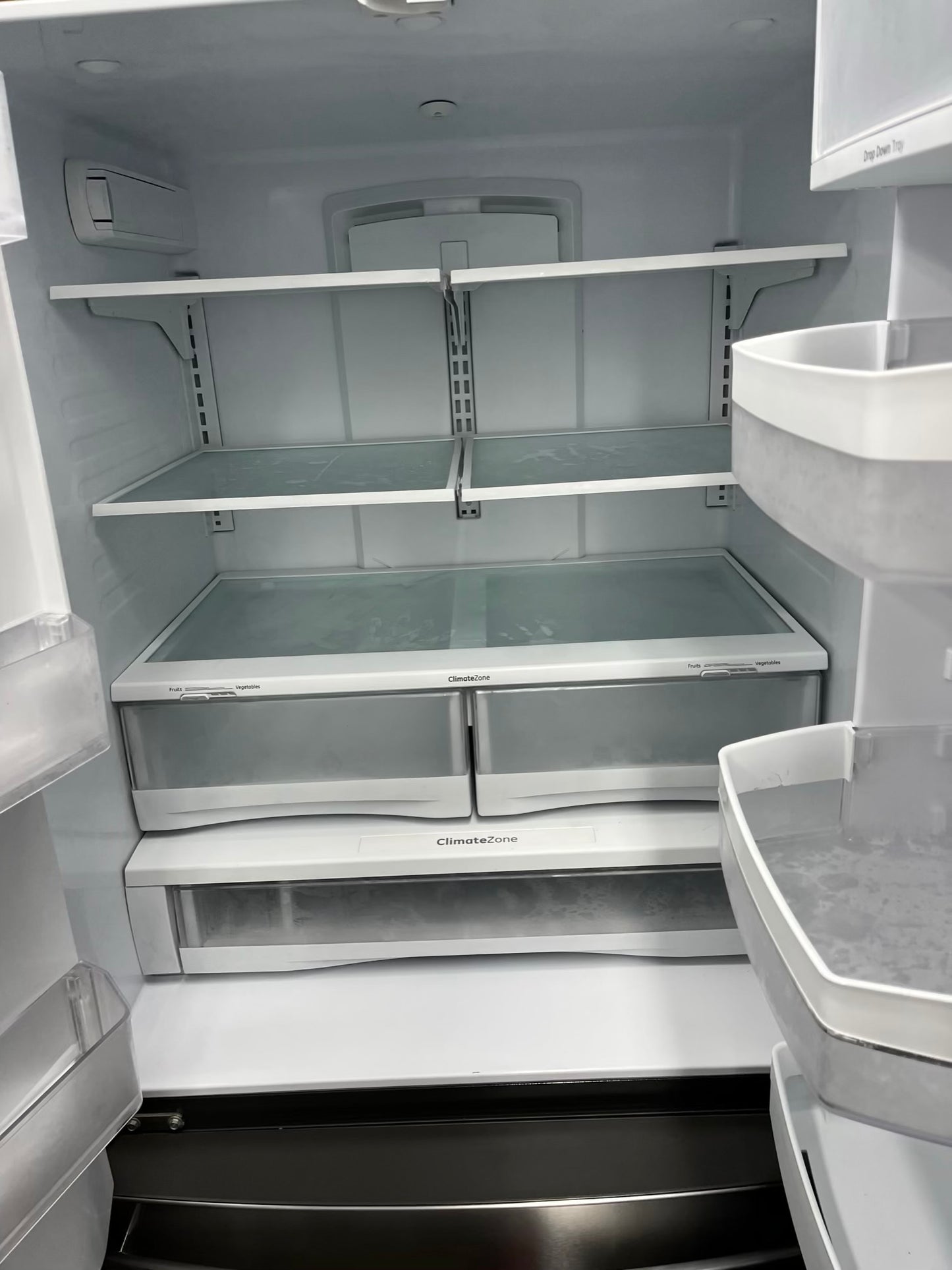 ^ #RF47W GE french door refrigerator slate stainless steel w/ ice and water dispenser inside 33” in