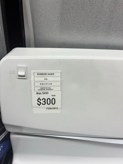 Kenmore gas range , 4 burner cream color 30”