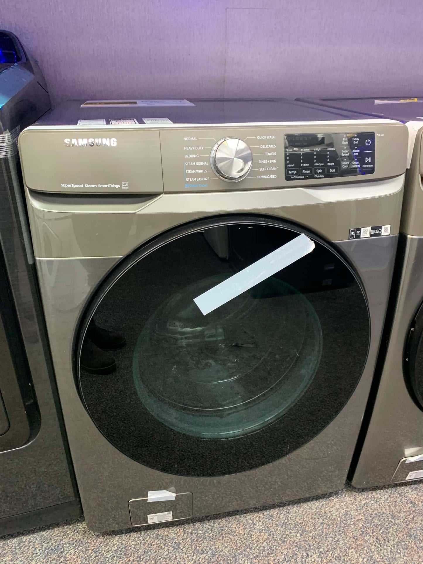 Samsung Open Box 4.5 cu. ft. High-Efficiency Front Load Washer with Self-Clean+ in champagne 27”