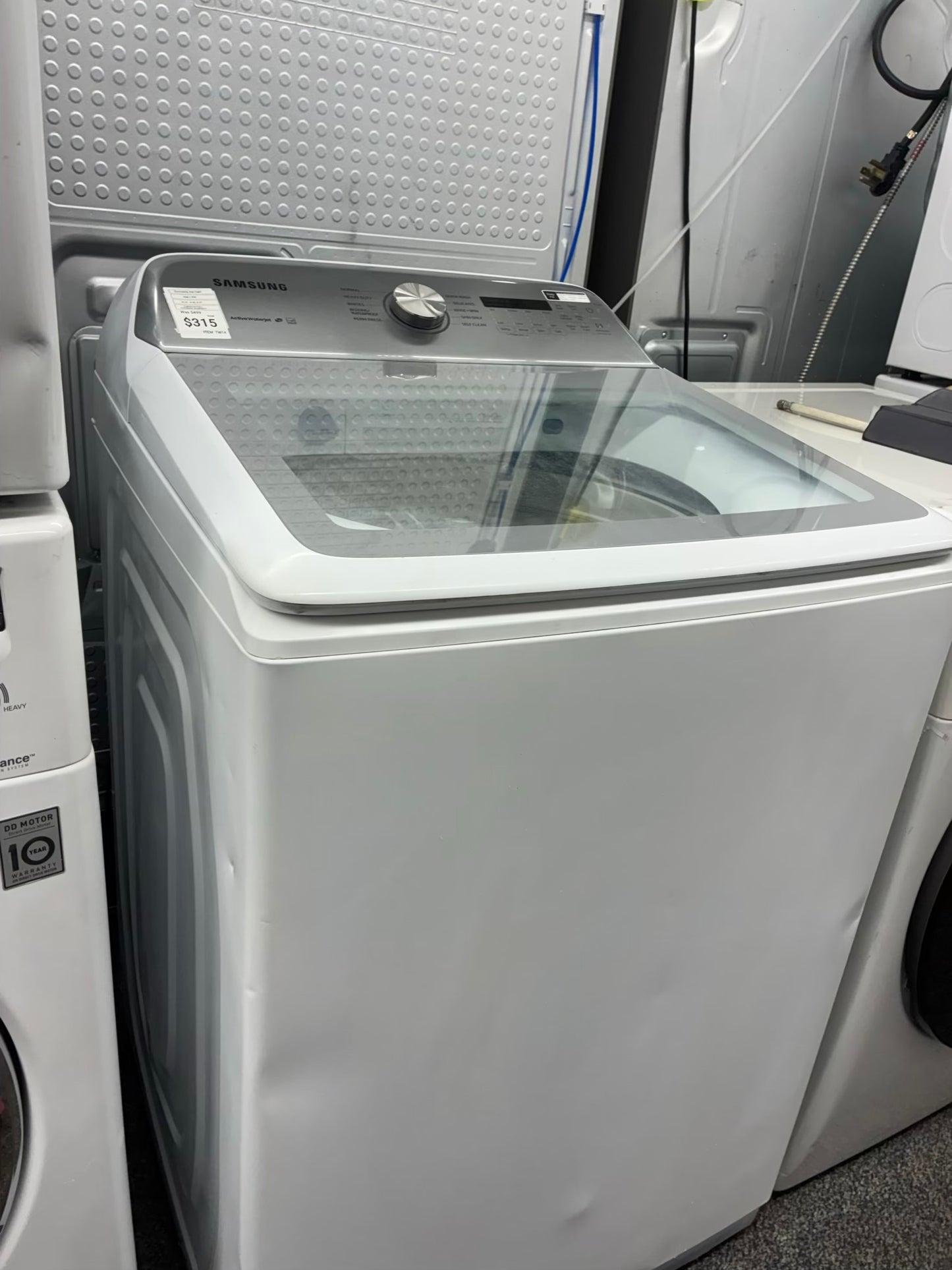 Samsung top load washer  large capacity side x side 27”