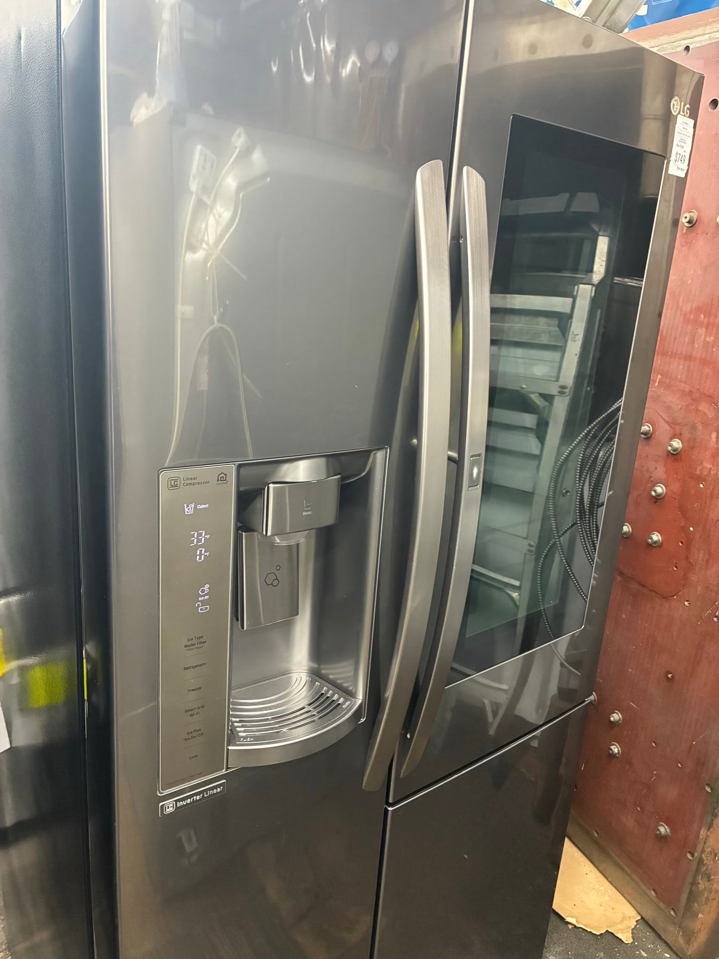 LG. Side by side smart refrigerator  with craft ice  maker water dispenser 36” in