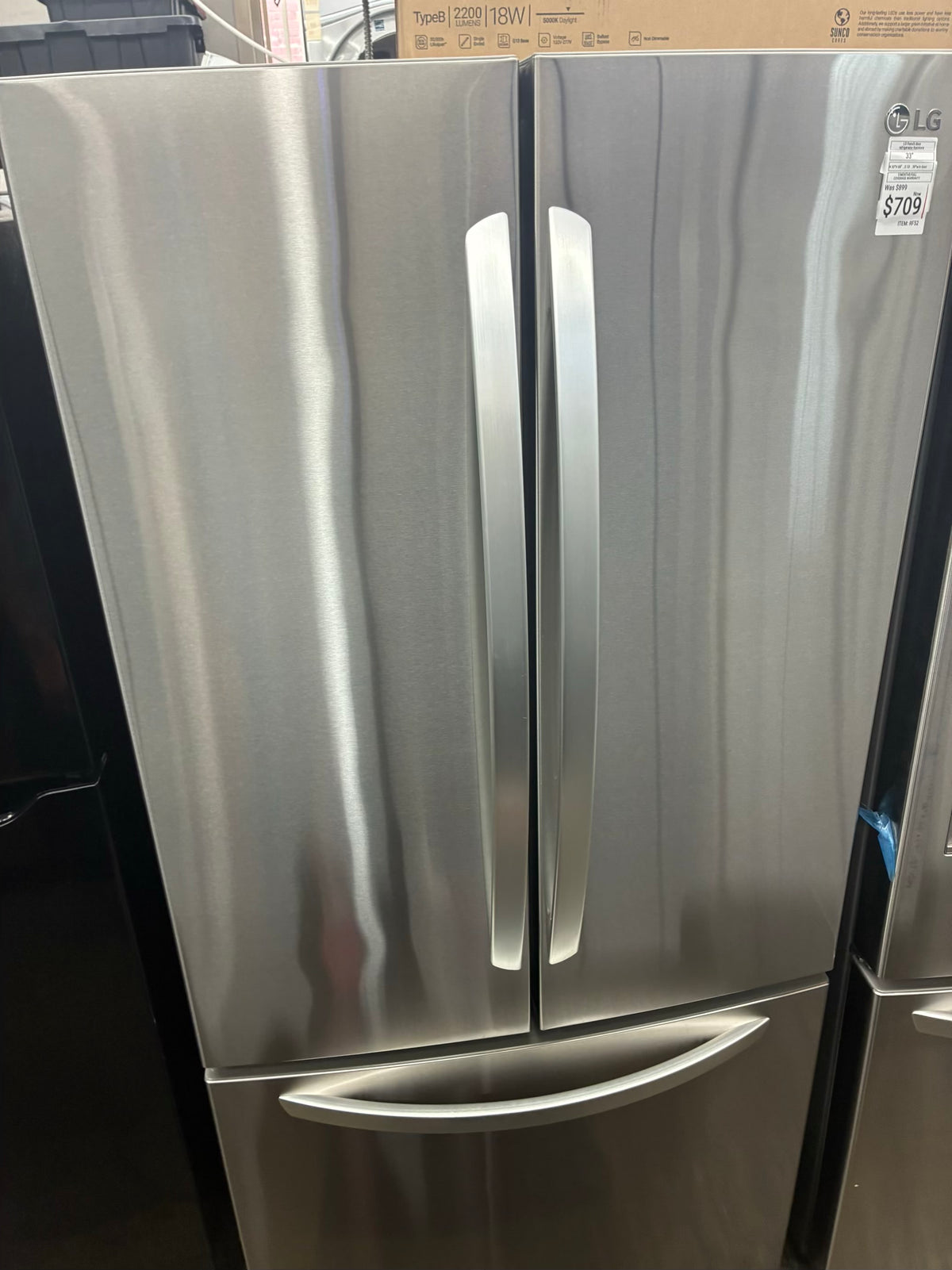 LG  French door refrigerator stale stainless steel 33” water dispenser