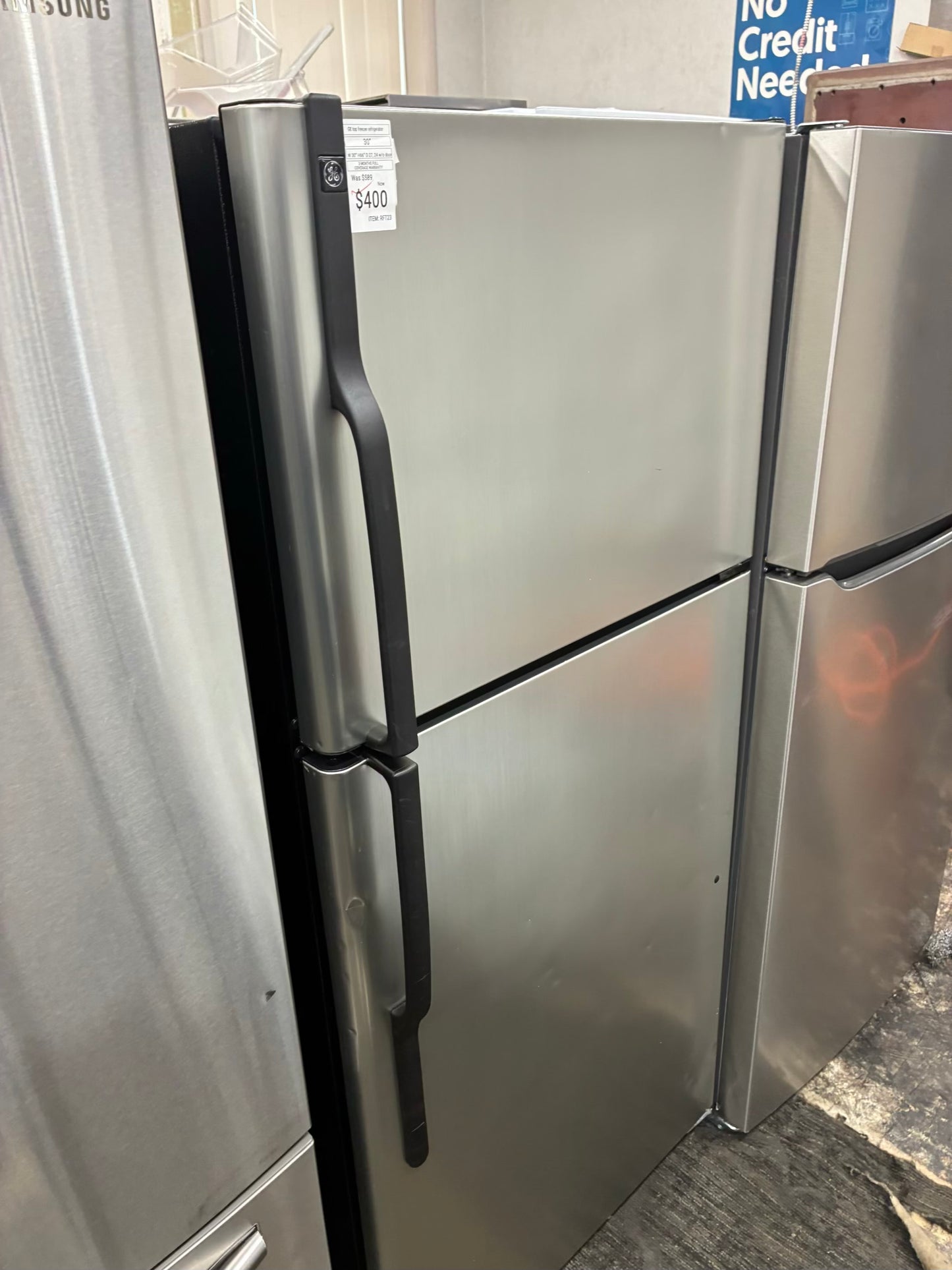 GE top freezer refrigerator stainless steel 30”