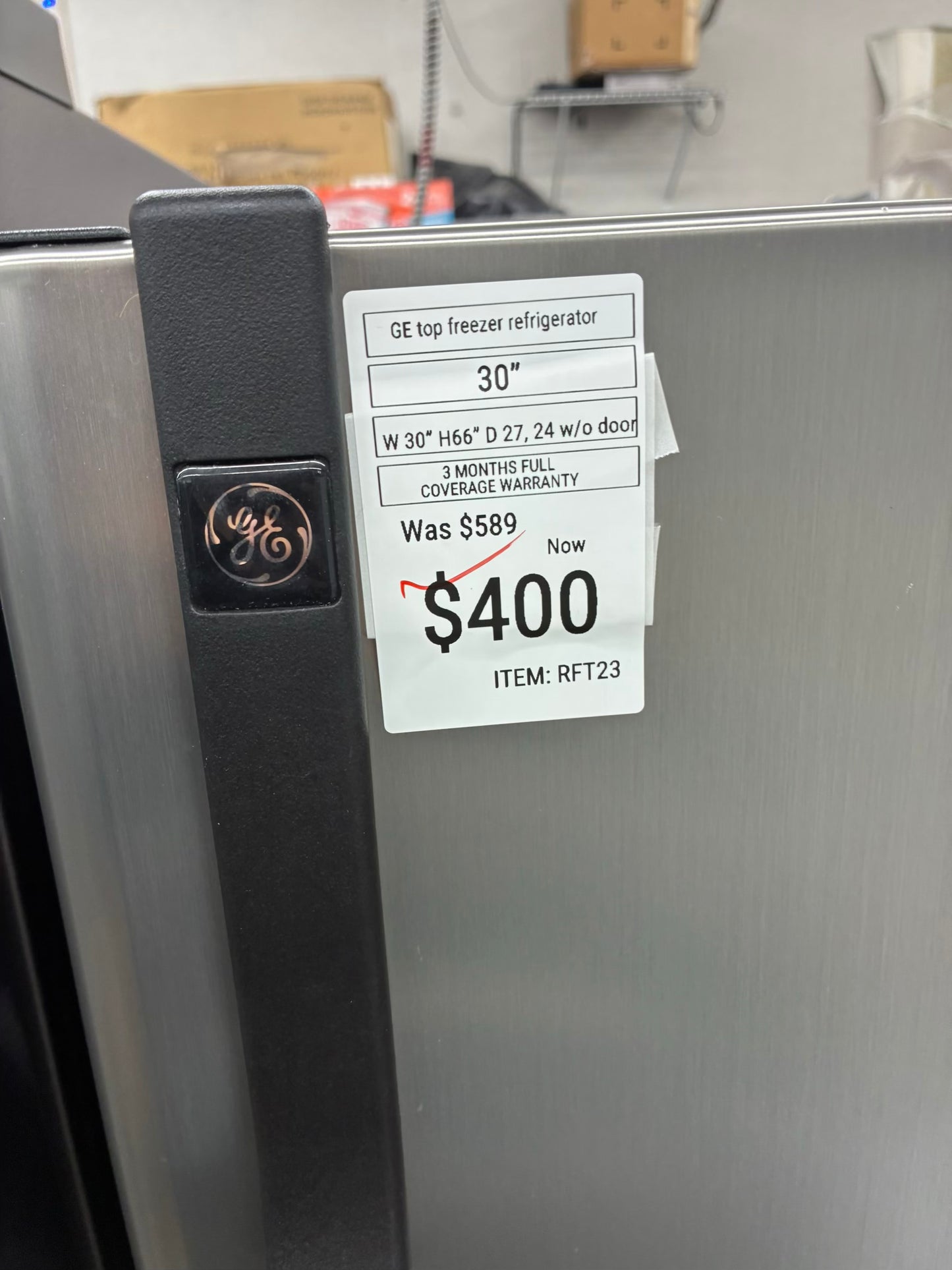 GE top freezer refrigerator stainless steel 30”