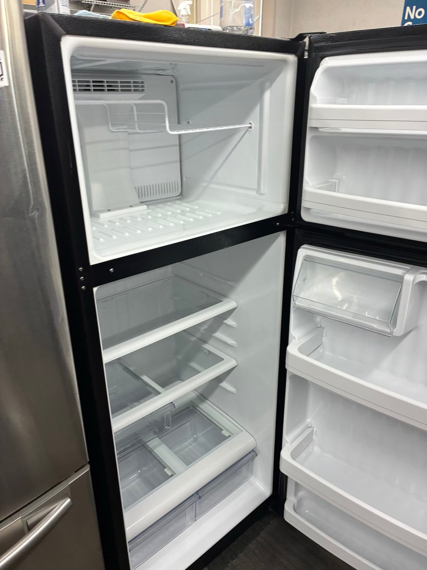 GE top freezer refrigerator black 28”